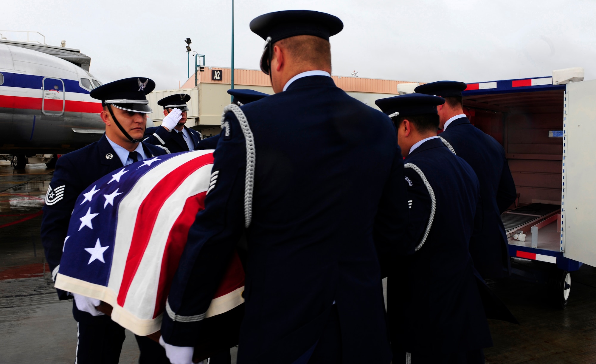 EL PASO, Texas -- Members of the Holloman Air Force Base, N.M., Steel Talons Honor Guard transfer the remains of Senior Airman Sean McGinnis, Jan. 22. Airman McGinnis was assigned to the 49th Maintenance Squadron and stored munitions to support multiple agencies to include the F-22A Raptor, 46th Test Group, White Sands Missile Range and German Air Force. (U.S. Air Force photo by Senior Airman Tiffany Trojca)