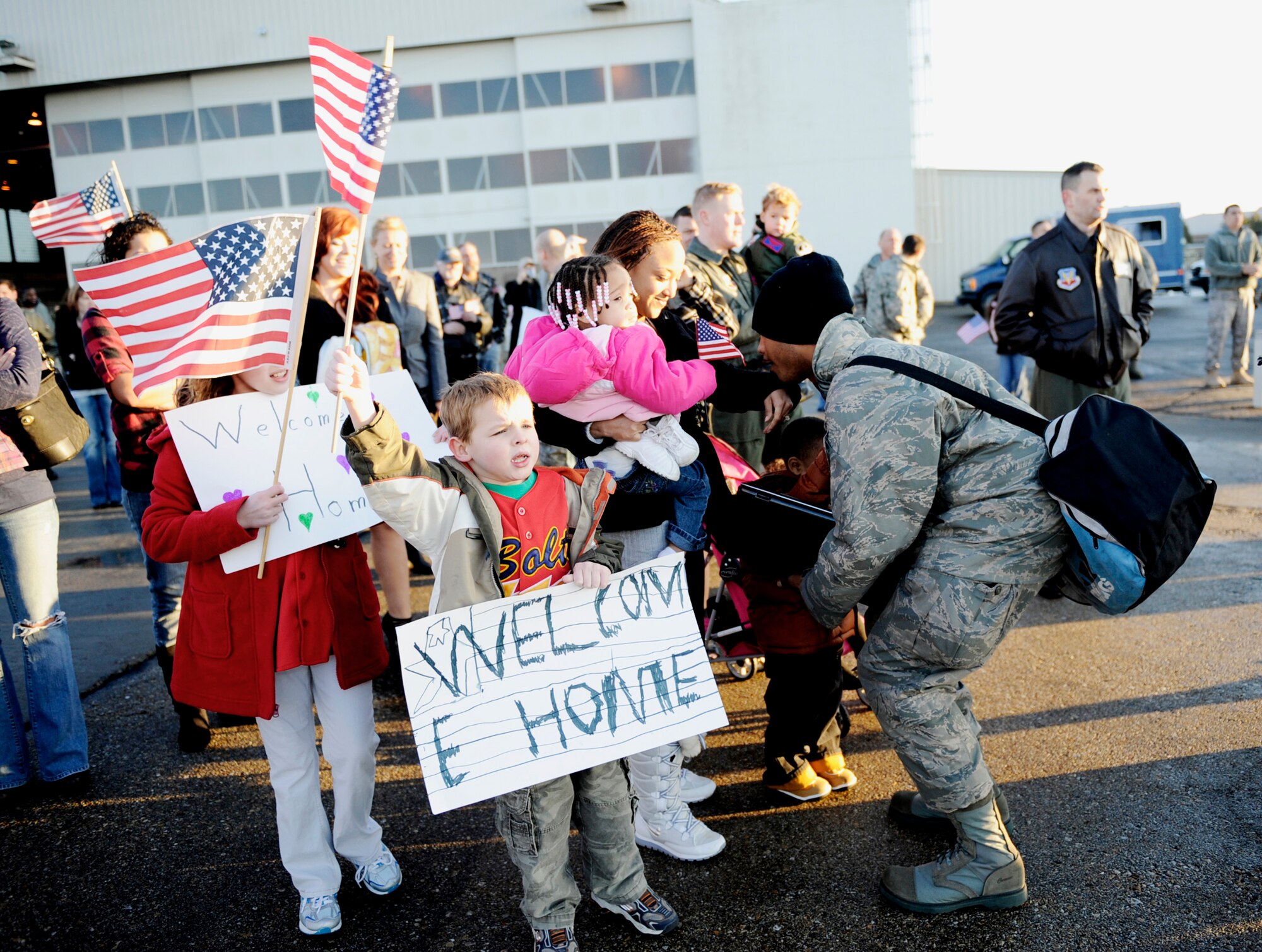 Families of the 389th Fighter Squadron wait for their loved ones returning from a four-month deployment to South Korea Jan. 20, 2010, at Mountain Home Air Force Base, Idaho. More than 300 members of the 389th FS returned from their deployment in support of U.S. government and Department of Defense global engagement strategies. (U.S. Air Force photo/Airman 1st Class Renishia Richardson)