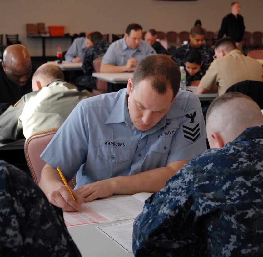 Sailors assigned to Naval Air Facility Washington take the E-7 rating advancement exam Jan. 21, 2010, at the Community Activities Center. The exam, given every six months, test the Sailor’s knowledge in their career field and general knowledge on basic military requirements. (U.S. Navy photo by MC2 Clifford L. H. Davis)