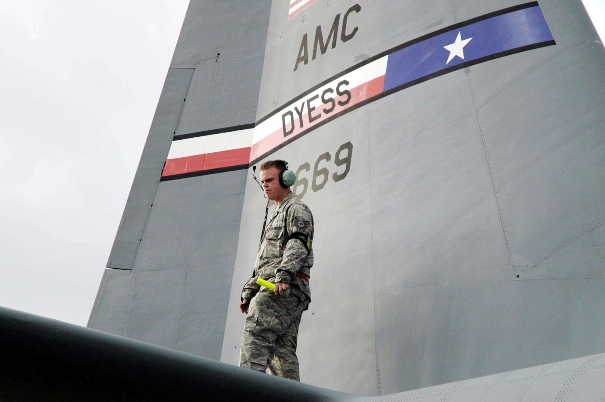 A 317th Airlift Group Airman inspects a C-130 Hercules prior to takeoff Jan. 17, 2010 at Pope Air Force Base, N.C. The C-130 crew of six departed Dyess AFB, Texas to support relief efforts following the 7.0-magnitude earthquake in Haiti Jan. 12, 2010. (U.S. Air Force photo)