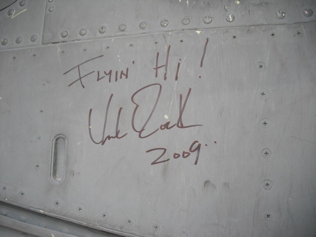 Kid Rock autographed a Nebraska Air National Guard KC-135R Stratotanker while touring the Al Udeid, AB flightline on December 6, 2009. Kid Rock was doing a USO show at Al Udeid for troops deployed there is support of the global war on terror. (Nebraska Air National Guard photo by Capt. Lloyd Blessington)