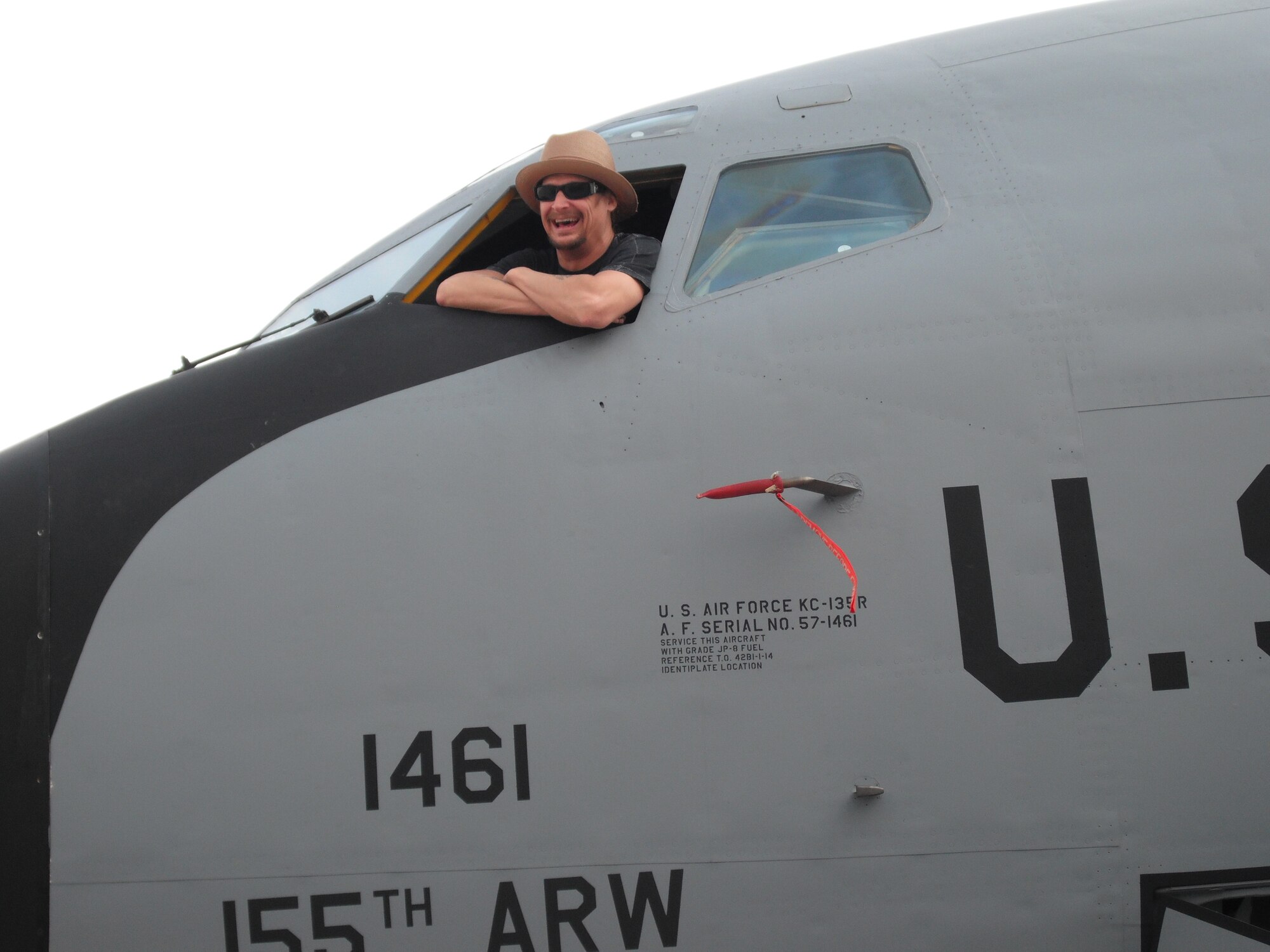 Kid Rock looks out from a Nebraska Air National Guard KC-135R Stratotanker on December 6, 2009 while doing a USO show for deployed troops at Al Udeid AB, Qatar. The Stratotanker was one of two 155th Air Refueling Wing aircraft deployed to Al Udeid, AB. (Nebraska Air National Guard photo by Capt. Lloyd Blessington)