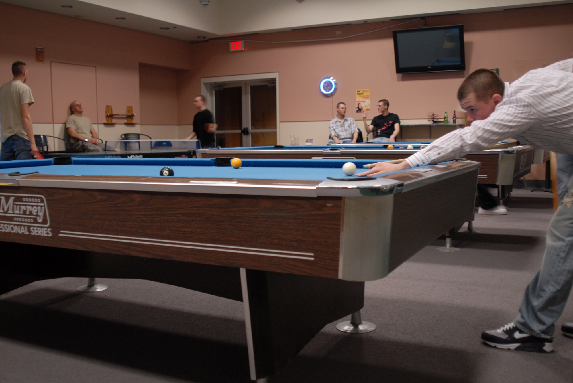GOODFELLOW AIR FORCE BASE, Texas -- Private 1st Class Tyler Stanco, 344th Military Intelligence Battalion student, lines up a shot during a base billiards tournament, Jan. 22, 2010. Private Stanco took first place in the tournament. (U.S. Air Force photo/Staff Sgt. Laura R. McFarlane)
