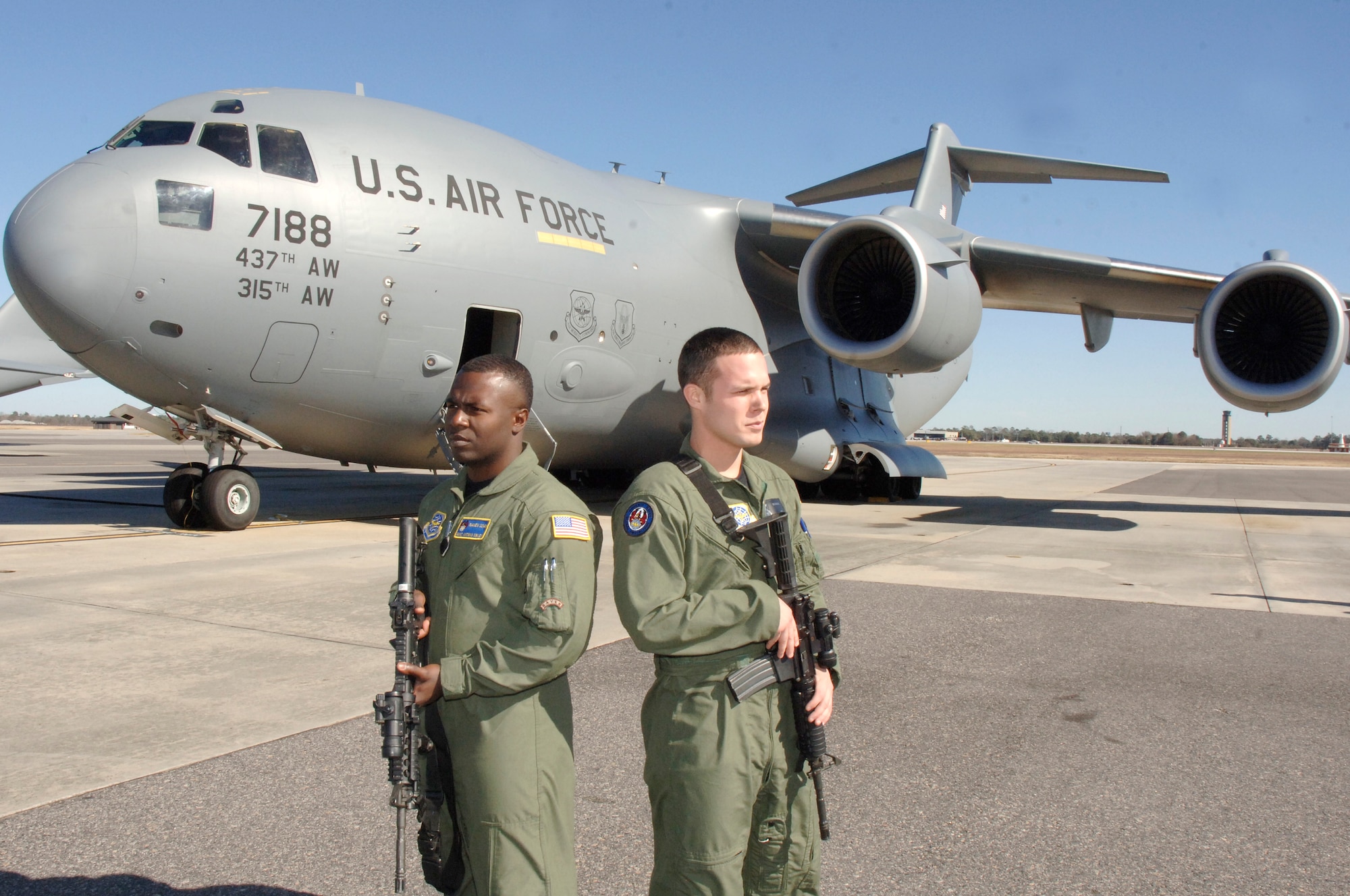 Staff Sgts. Antwan Sibley, left, and Joseph Burton, right, are Phoenix Ravens with the 628th Security Forces Squadron at Charleston AFB, S.C. Security forces Airmen who become Ravens have been through a screening process to include reviewing Enlisted Performance Reports, standardization and evaluation reports, a physical fitness test and a 45-day apprentice course before going to the official Phoenix Raven school. (U.S. Air Force photo/Staff Sgt. Marie Brown)