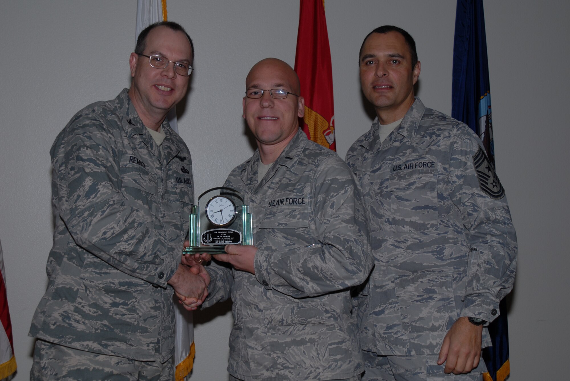GOODFELLOW AIR FORCE BASE, Texas -- 1st Lt. David Abbott, 17th Medical Support Squadron, receives 17th Training Wing CGO of the Quarter during the wing quarterly award ceremony, Jan. 26, 2010. (U.S. Air Force photo/Staff Sgt. Laura R. McFarlane)
