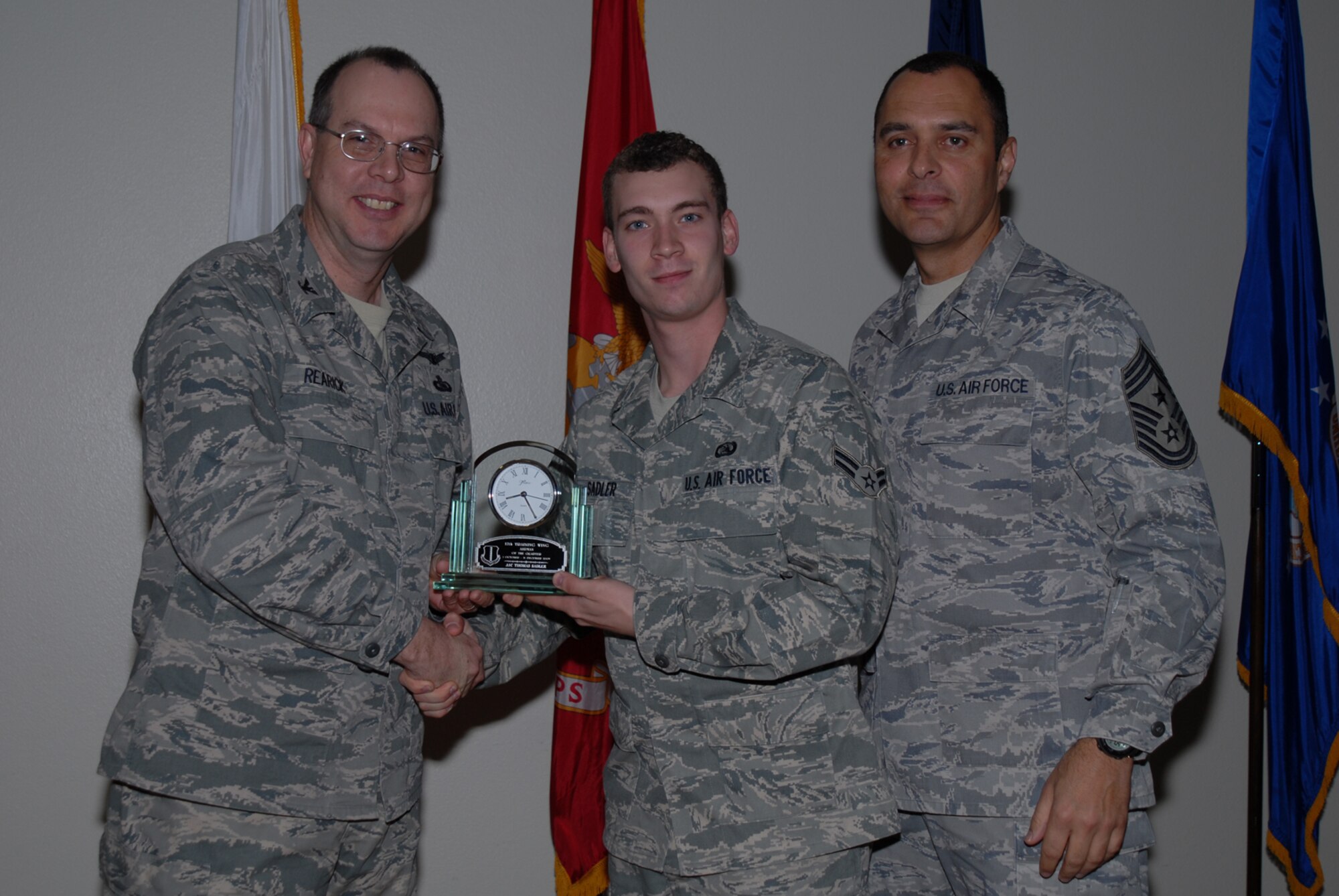 GOODFELLOW AIR FORCE BASE, Texas -- Airman 1st Class Thomas Sadler, 17th Training Support Squadron, receives 17th Training Airman of the Quarter during the wing quarterly award ceremony, Jan. 26, 2010. (U.S. Air Force photo/Staff Sgt. Laura R. McFarlane)
