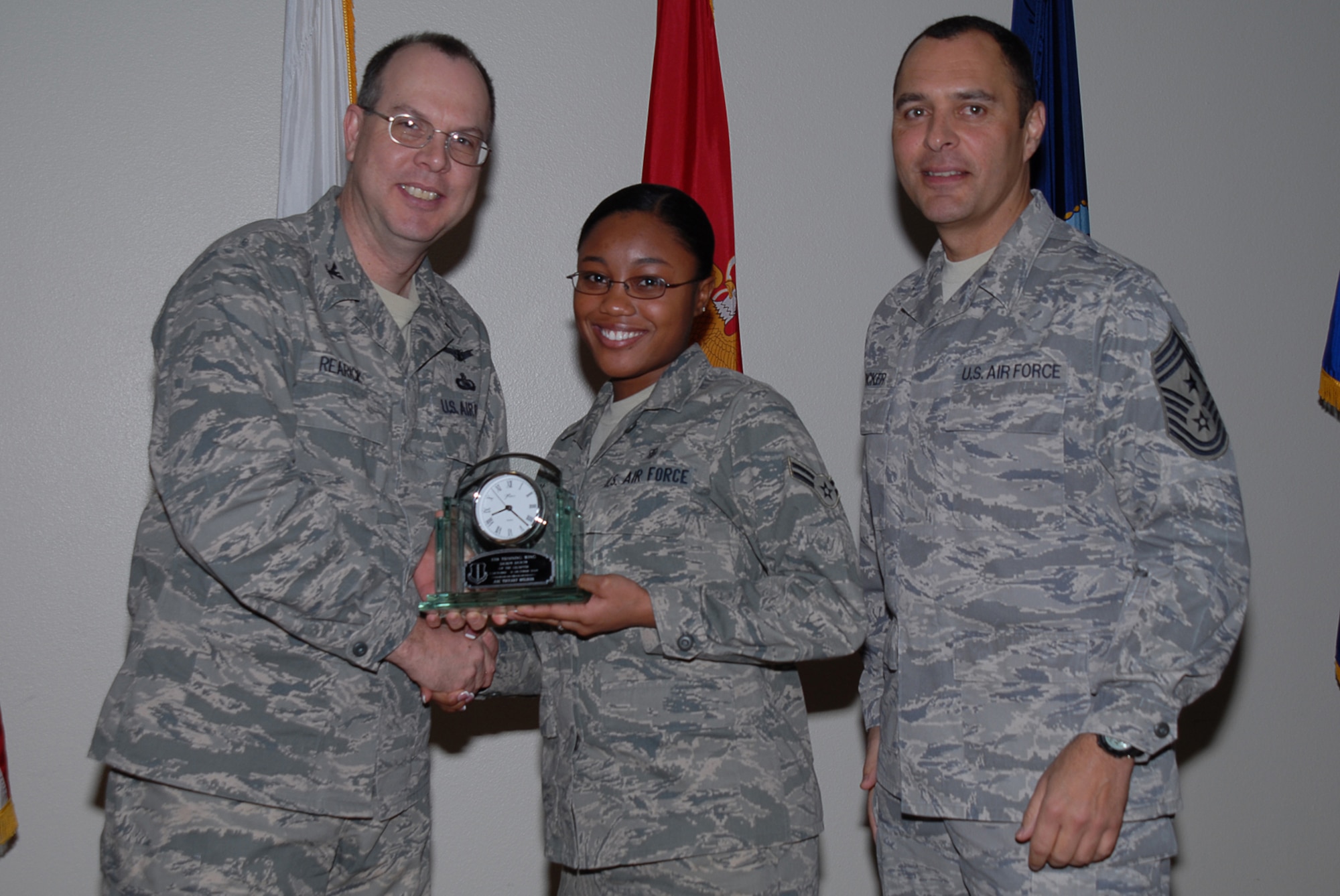 GOODFELLOW AIR FORCE BASE, Texas -- Airman 1st Class Tiffany Wilson, 17th Medical Operations Squadron, receives 17th Training Wing Dorm Room of the Quarter during the wing quarterly award ceremony, Jan. 26, 2010. (U.S. Air Force photo/Staff Sgt. Laura R. McFarlane)
