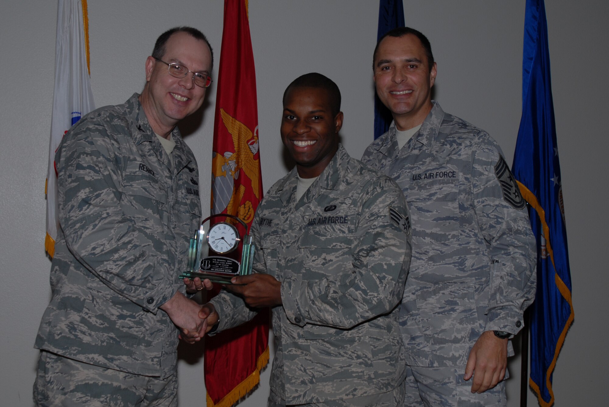 GOODFELLOW AIR FORCE BASE, Texas -- Senior Airman Jonathan Blythe, 17th Comptroller Squadron, receives 17th Training Wing Honor Guard of the Quarter during the wing quarterly award ceremony, Jan. 26, 2010. (U.S. Air Force photo/Staff Sgt. Laura R. McFarlane)
