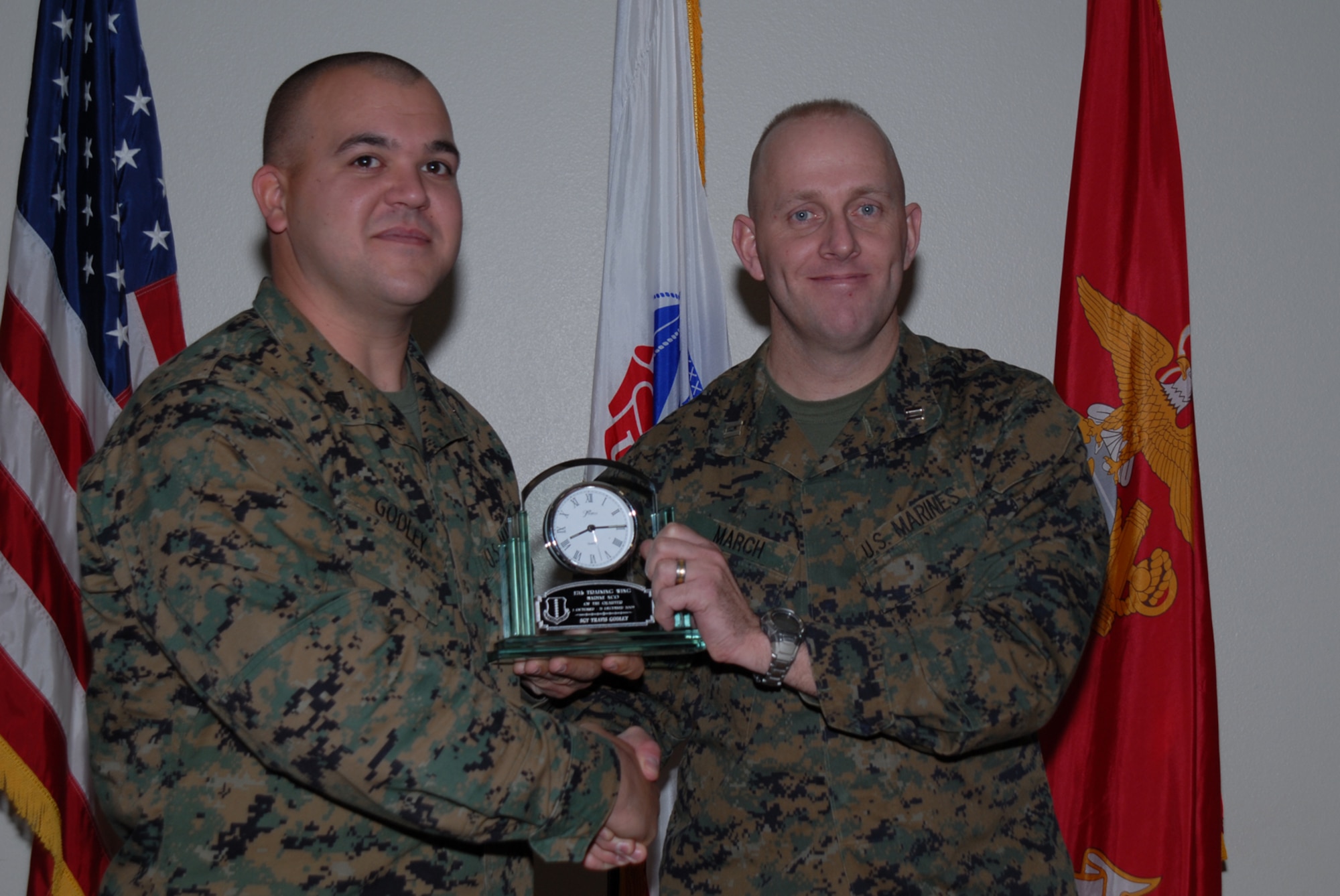 GOODFELLOW AIR FORCE BASE, Texas -- Marine Sgt. Travis Godley, Marine Corps Detachment, receives 17th Training Wing Marine NCO of the Quarter during the wing quarterly award ceremony, Jan. 26, 2010. (U.S. Air Force photo/Staff Sgt. Laura R. McFarlane)
