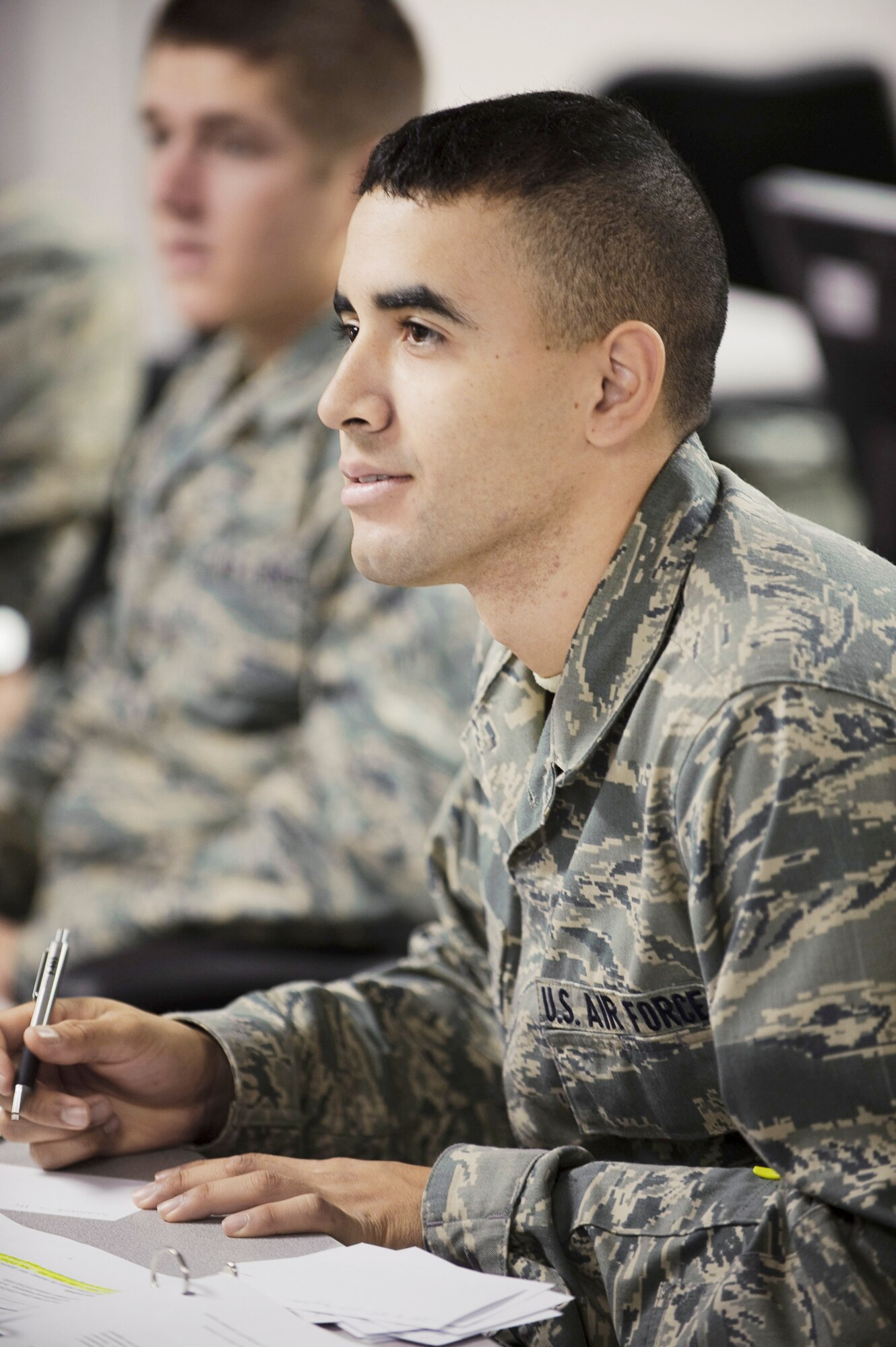 Airman Basic Luis Zayas listens during a review of the previous day's lesson on the electromagnetic spectrum during phase one of the Remotely Piloted Aircraft sensor operator training taught by 12th Operations Group, Det. 1, Jan. 19, 2010, at Randolph Air Force Base, Texas. Airman Zayas is a Basic Sensor Operator Course student. (U.S. Air Force photo/Steve Thurow)