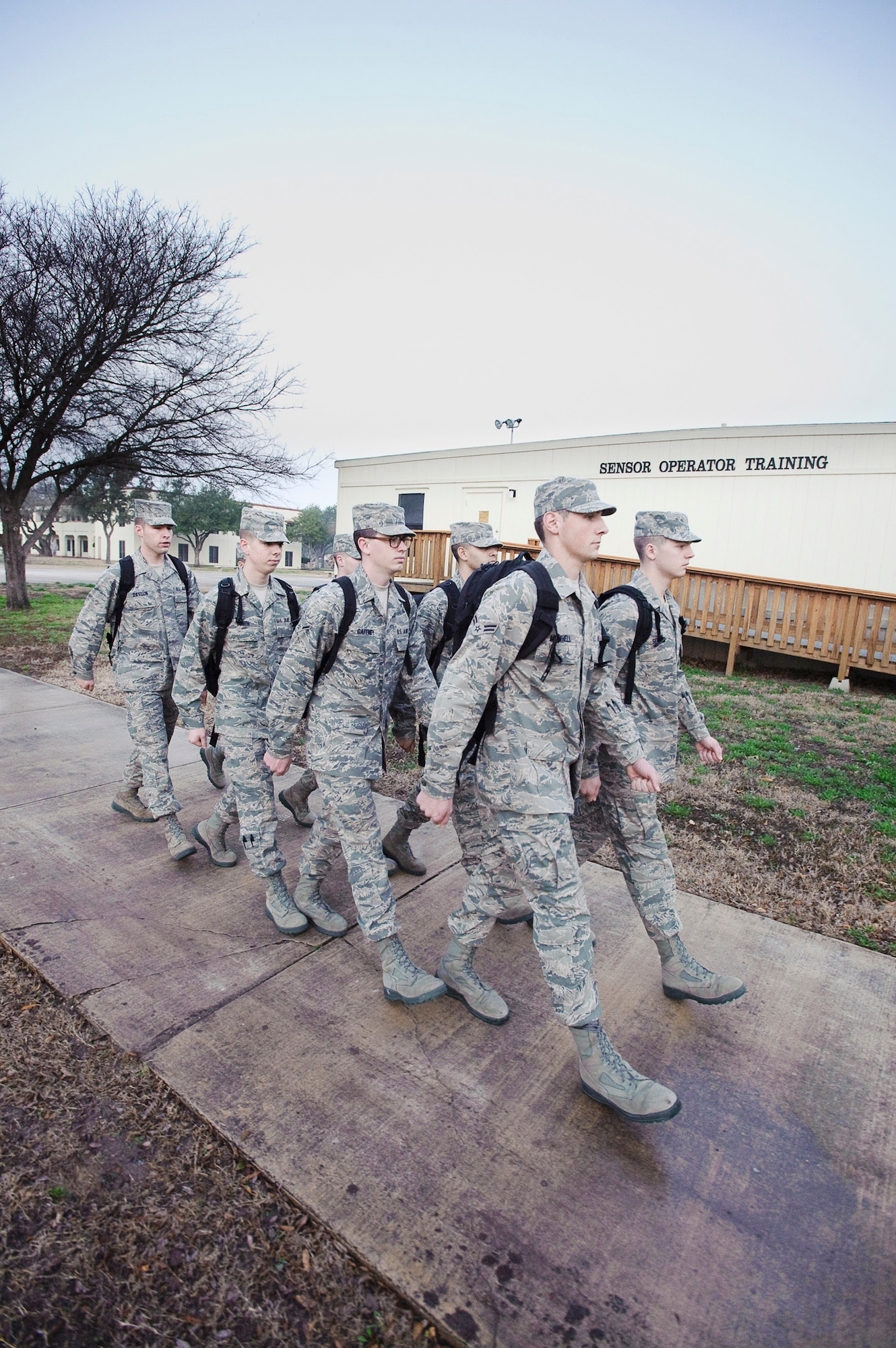 Nonprior service students march to class during the first week of the Basic Sensor Operator Course taught by 12th Operations Group, Det. 1, remotely piloted aircraft sensor operator instructors Jan. 20, 2010, at Randolph Air Force Base, Texas. (U.S. Air Force photo/Steve Thurow)