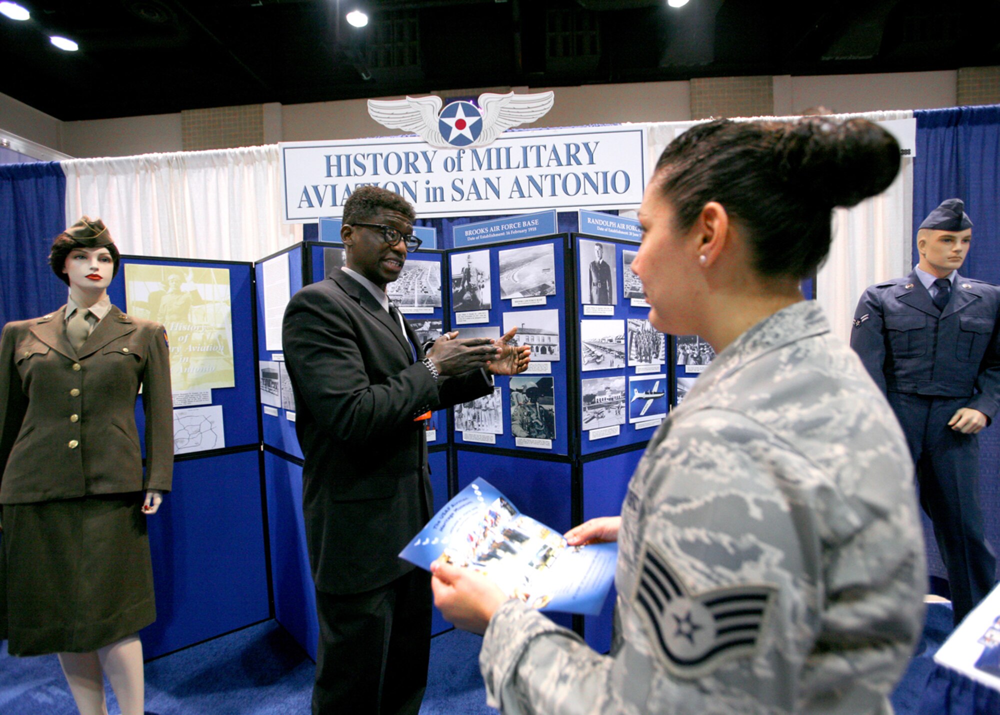Tracy English, 37th Training Wing Historian, discusses the history of military aviation in San Antonio during the 2010 Air Education and Training Command Symposium Jan. 14. More than 3,700 people attended the two-day symposium held at the Henry B. Gonzalez Convention Center, the largest showing to date. (U.S. Air Force photo/Robbin Cresswell) 
