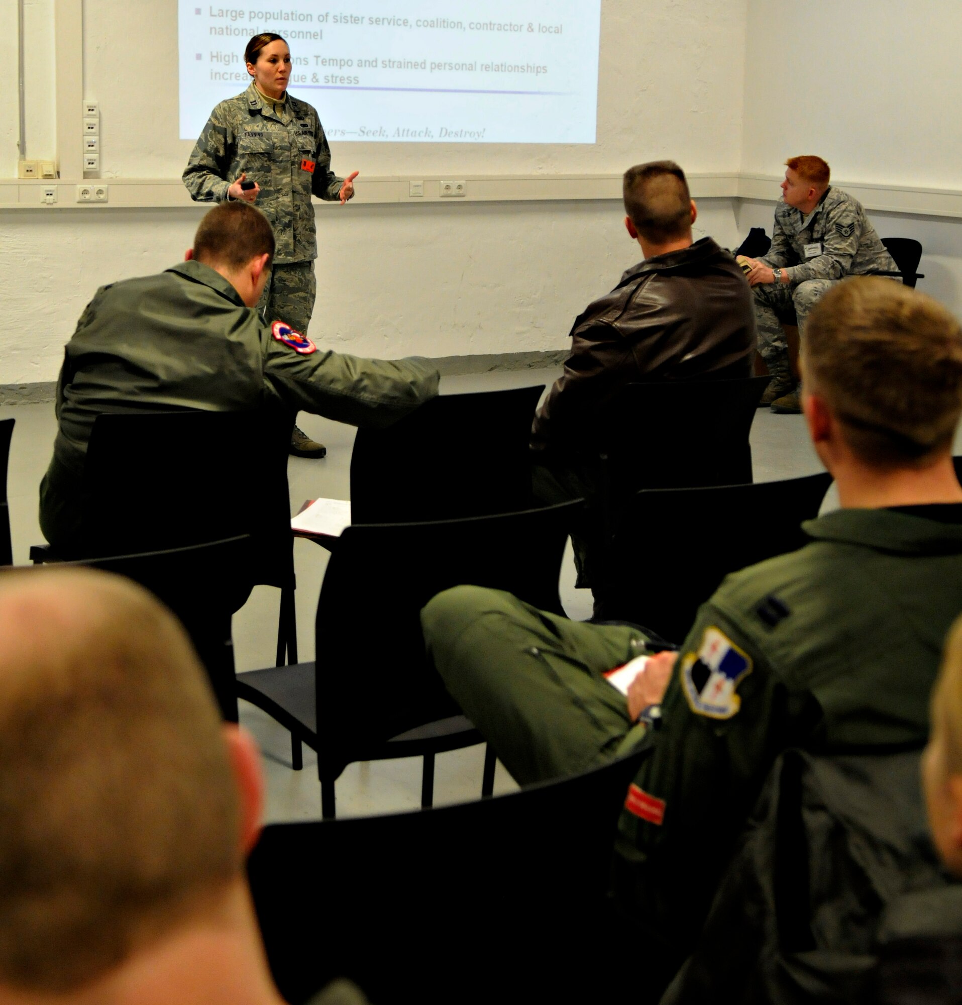 SPANGDAHLEM AIR BASE, Germany – Capt. Jamie Fanning, 52nd  Fighter Wing sexual assault response coordinator, briefs deployers at a personnel deployment function line during Operation Saber Crown 10-03 Jan. 20 in Bldg. 103. The exercise evaluated the wing’s ability to support short-notice deployments and to prepare for the upcoming operational readiness inspections and NATO force evaluation this summer. (U.S. Air Force photo/Airman 1st Class Staci Miller)