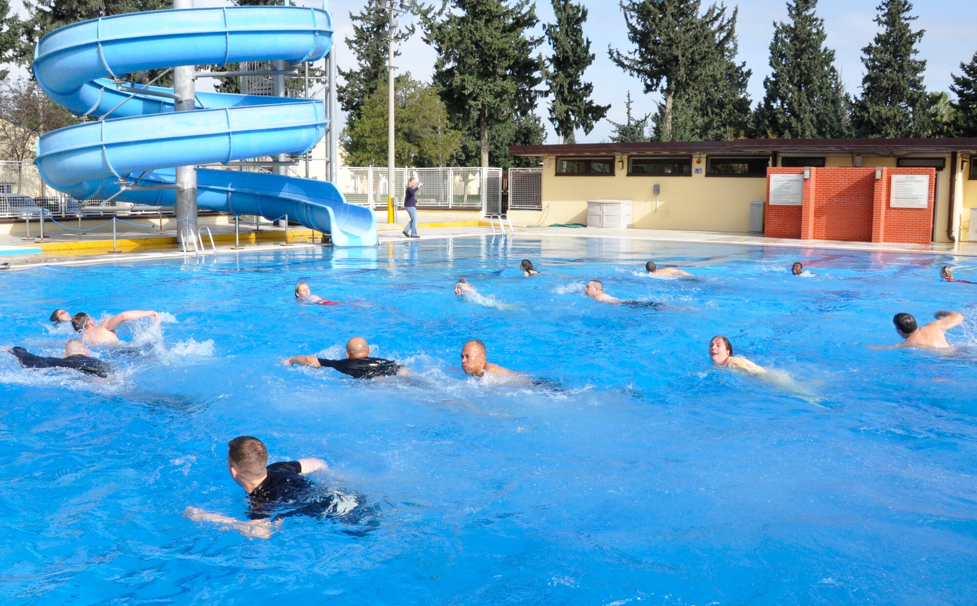 Participants of the Polar Plunge swim in cold water at the base pool Saturday, Jan. 23, 2010 at Incirlik Air Base, Turkey.  The 39th Force Support Squadron sponsored event challenged people to test their bravery and tolerance to cold water.  Participants were encouraged to wear costumes for a chance to win prizes for best costume and best theme.  (Courtesy Photo)