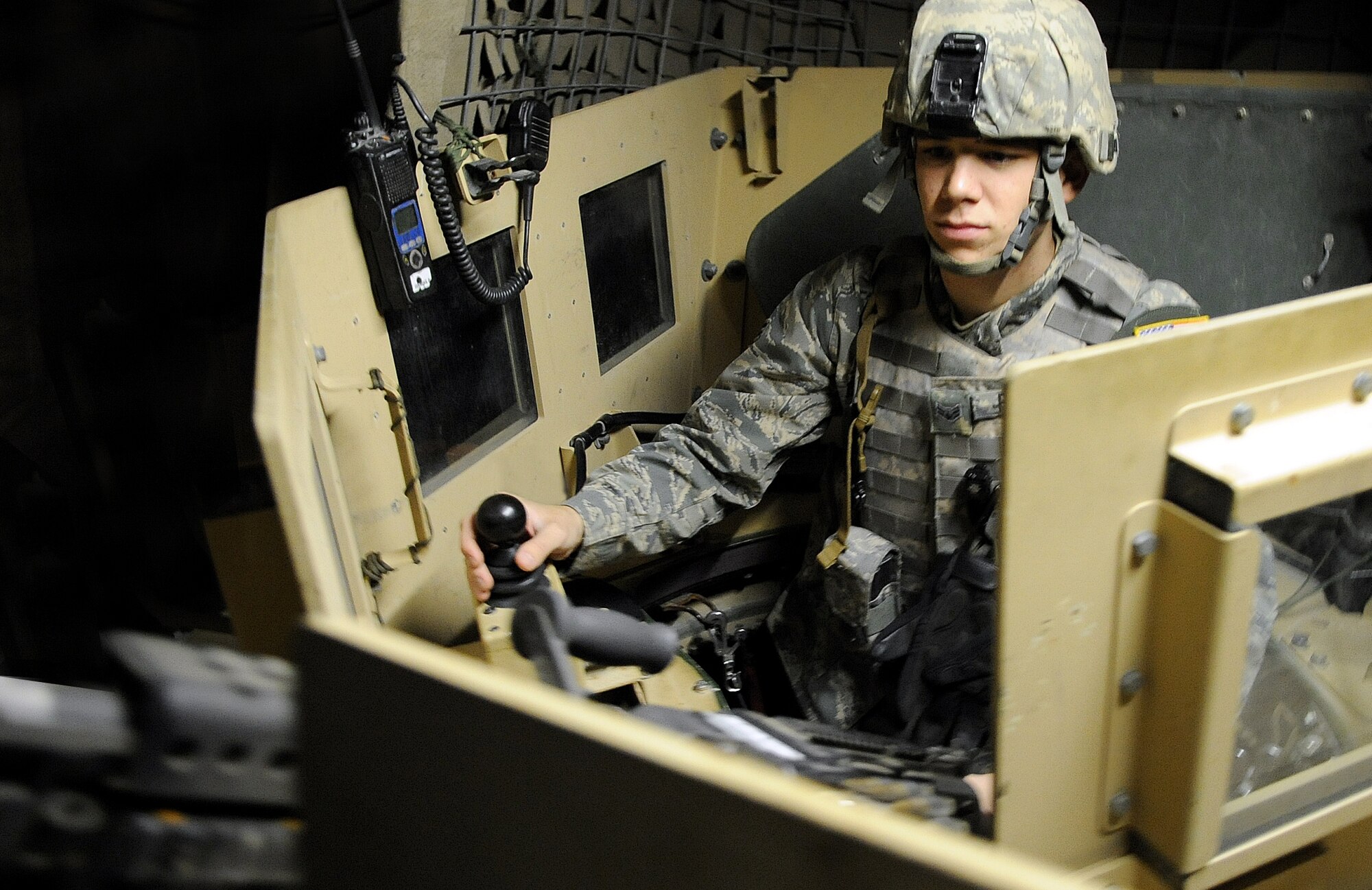 KIRKUK REGIONAL AIR BASE, Iraq – Airman 1st Class Cody Pittman, 506th Expeditionary Security Forces Squadron heavy weapon member, mans the turret of his humvee Jan. 23, 2010. This is Airman Pittman’s first deployment, and his job is to be the eyes and ears for the other members of his patrol team.  He is deployed from the 940th SFS, Beale AFB, Calif. (U.S. Air Force photo/Staff Sgt. Tabitha Kuykendall)