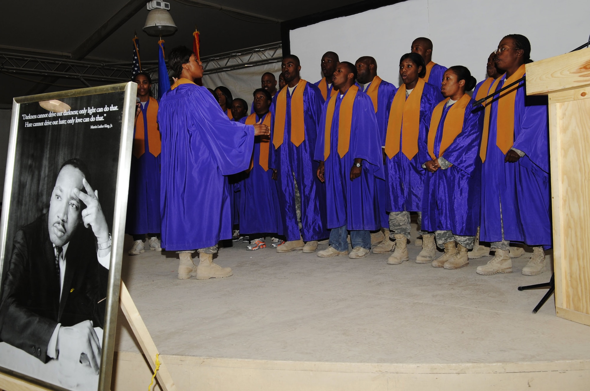 The Fraise Chapel Gospel Choir performs a musical selection during a Dr. Martin Luther King, Jr., commemoration service here Jan. 18, 2010.  This service was sponsored by the 451st Air Expeditionary Wing and Kandahar Airfield Equal Opportunity community to help remember, celebrate and act, that all may never forget Dr. King’s dream.  (U.S. Air Force photo/Senior Airman Nancy Hooks/Released)