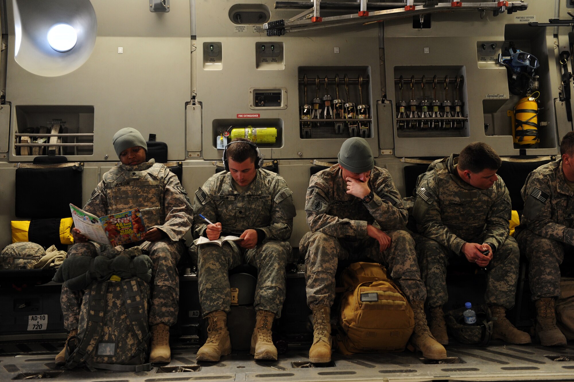 U.S. Army Soldiers prepare for takeoff aboard a C-17A Globemaster III bound for a forward operating base in Southwest Asia, Jan. 20, 2010. The aircrew and aircraft are assigned to the 816th Expeditionary Airlift Squadron. (U.S. Air Force photo/Staff Sgt. Manuel J. Martinez)