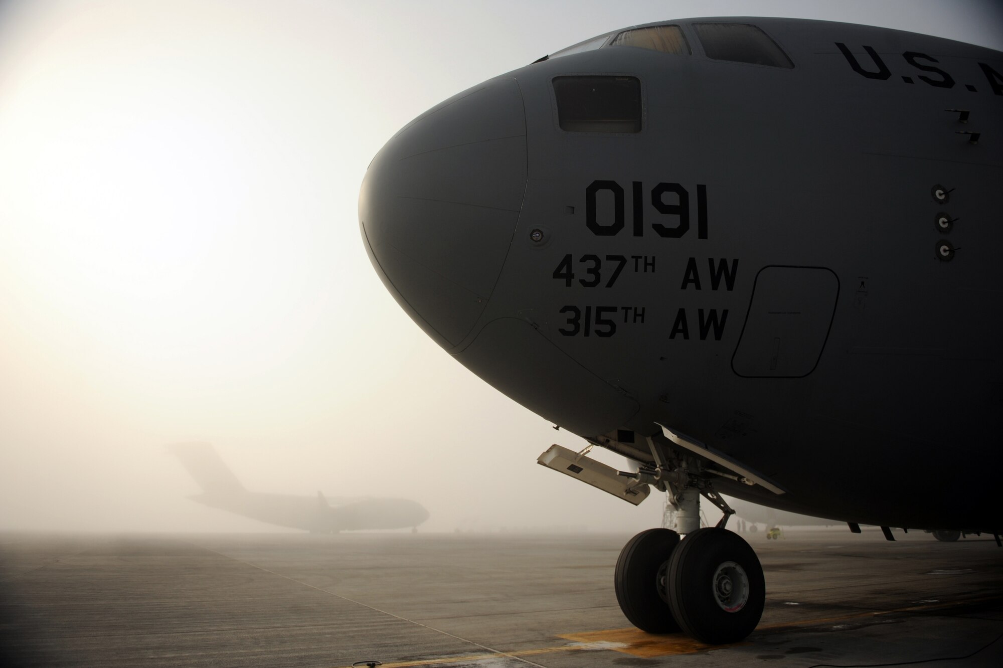 A C-17A Globemaster III parked on a flightline in Southwest Asia. Airmen inside, assigned to the 816th Expeditionary Airlift Squadron, conduct preflight checks prior to an airlift mission bound for Afghanistan Jan. 20, 2010. (U.S. Air Force photo/Staff Sgt. Manuel J. Martinez)