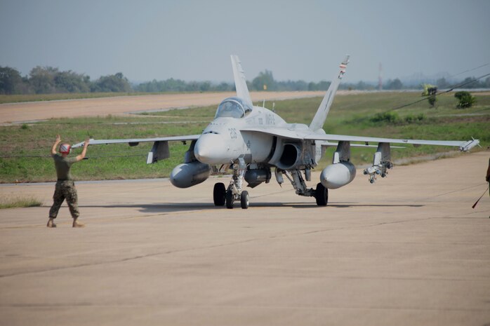 A Marine Fighter Attack Squadron 115 F/A-18 hornet lands from training in preparation for exercise Cobra Gold 2010 at Korat Royal Thai Air Force Base, Kingdom of Thailand Jan. 27. VMFA-115 also participated in Arden Blitz in South Korea, and Ryuoko Air Warrior and Wolmido Fury in Okinawa, Japan, while deployed here under the Unit Deployment Program.