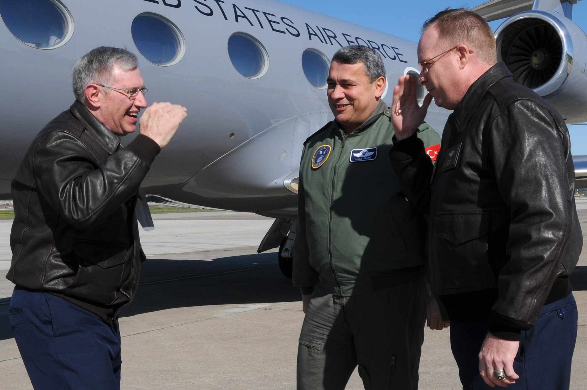 Turkish Air Force Brig. Gen. Haluk Selvi, 10th Tanker Base commander (middle), and Col. Eric Beene, 39th Air Base Wing commander (right), welcome Gen. Roger A. Brady, U.S. Air Forces in Europe commander, to Incirlik Air Base, Turkey.  General Brady and Chief Master Sgt. Pamela Derrow, USAFE command chief, visited the base Jan. 25-26, 2010.  (U.S. Air Force photo/Senior Airman Ashley Wood)