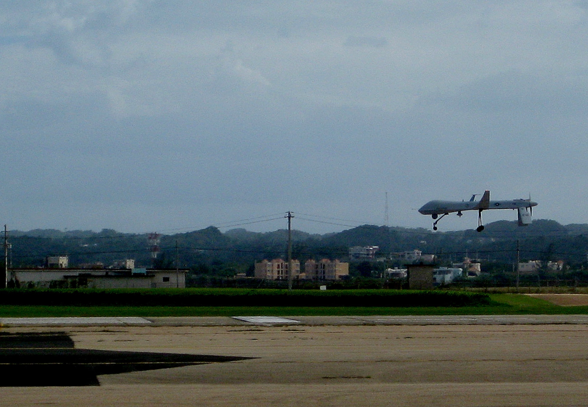 An RQ-1 Predator lands at Aeropuerto Rafael Hernandez outside Aquadilla, Puerto Rico on 27 Jan., 2010.  The RQ-1 remotely piloted systems are operating out of Puerto Rico to support Operation Unified Response in Haiti.  Airmen from Creech Air Force Base, Las Vegas, Nev. are providing 24 hour a day full-motion video in real time to international relief workers on the ground in order to speed humanitarian aid to remote and cut-off areas of the country following the earthquake on 12 Jan., 2010. (U.S. Air Force photo by Maj. Jeff Bright)
