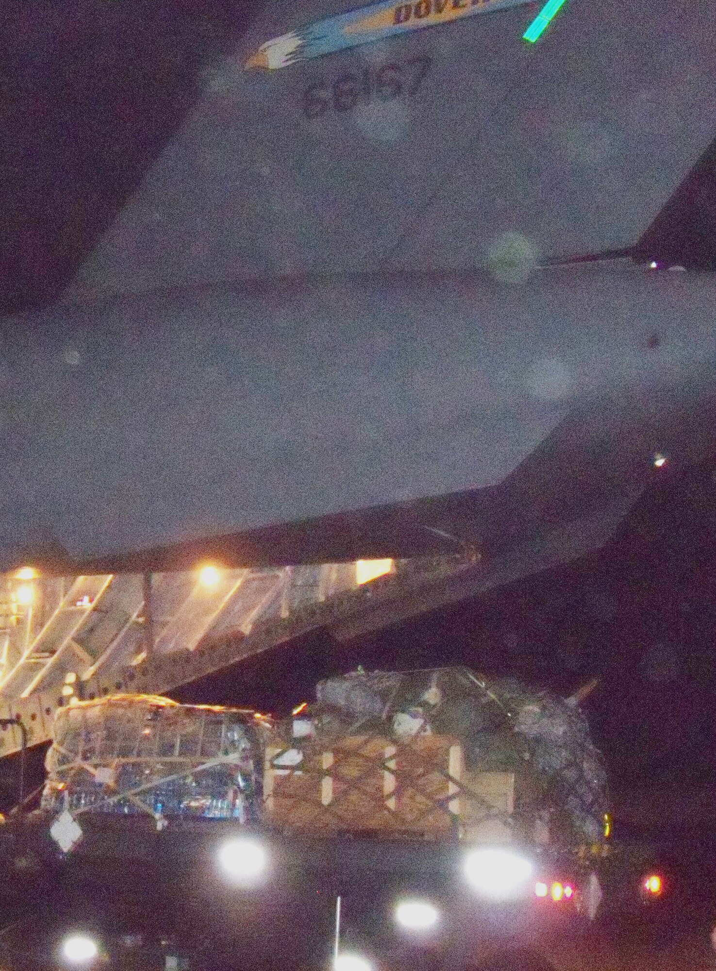 A C-17 Globemaster III crew from the 3rd Airlift Squadron at Dover Air Force Base, Del., drops off 90,000 pounds of disaster relief aid at the Port-au-Prince airport in Haiti on Jan. 19, 2010, in support of Operation Unified Response. After unloading the cargo, 36 evacuees boarded the aircraft which flew them to the U.S.  (U.S. Air Force photo/2nd Lt. Abigail Wise)