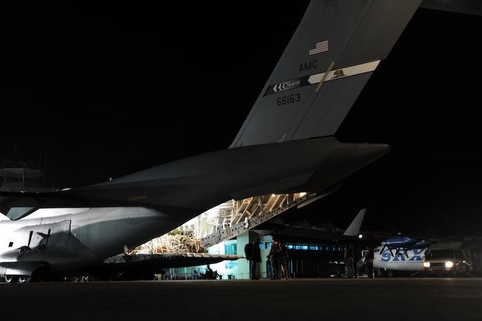 Special mission shipment of money waits to be unloaded from a Travis Air Force Base C-17 at Port-au-Prince, Haiti, Jan. 22, 2010. The cargo was sent from Charleston AFB along with members of security forces and intelligence squadrons to support Operation Unified Response. (U.S. Air Force photo/Senior Airman Katie Gieratz)(RELEASED)