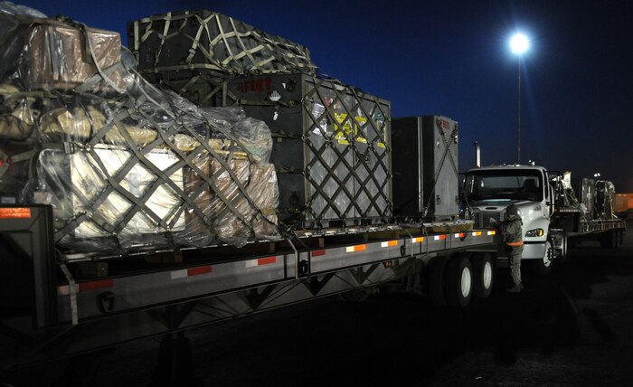NELLIS AIR FORCE BASE, Nev. -- Tech. Sgt. Christy Long, 99th Logistics Readiness Squadron, double-checks cargo paperwork in the early-morning hours during the 99th Air Base Wing Operational Readiness Inspection, Jan. 25.   (U.S. Air Force photo by Staff Sgt. Taylor Worley)