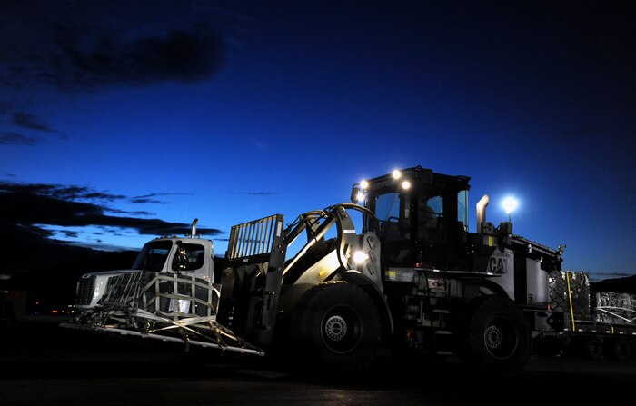 NELLIS AIR FORCE BASE, Nev. -- An Airman assigned to the 99th Logistics Readiness Squadron, moves cargo with a 10K all-terrain forklift during the Operational Readiness Inspection, Jan. 26. (U.S. Air Force photo by Airman 1st Class Brett Clashman)






















  












 











































  












 
























