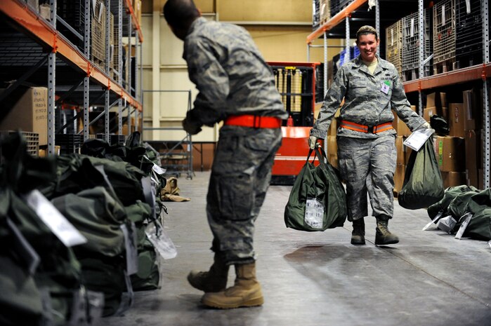 NELLIS AIR FORCE BASE, Nev. -- Senior Airman Jessica Clark, 99th Logistics Readiness Squadron, issues mobility bags to deploying Airman during the Operational Readiness Inspection, Jan. 26. (U.S. Air Force photo by Airman 1st Class Brett Clashman)






















  












 











































  












 
























