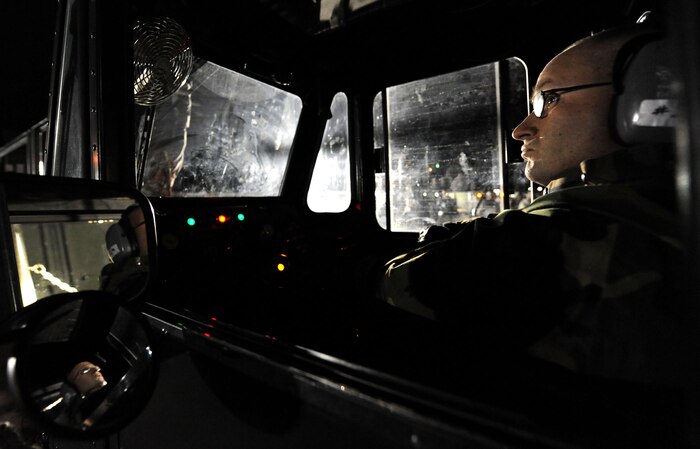 NELLIS AIR FORCE BASE, Nev. -- Senior Airman Jonathon Cantrell, 99th Logistics Readiness Squadron, waits for Airmen to move cargo off of a Tunner 60K Aircraft Cargo Loader during the Operational Readiness Inspection, Jan. 25. (U.S. Air Force photo by Airman 1st Class Brett Clashman)






















  












 











































  












 
























