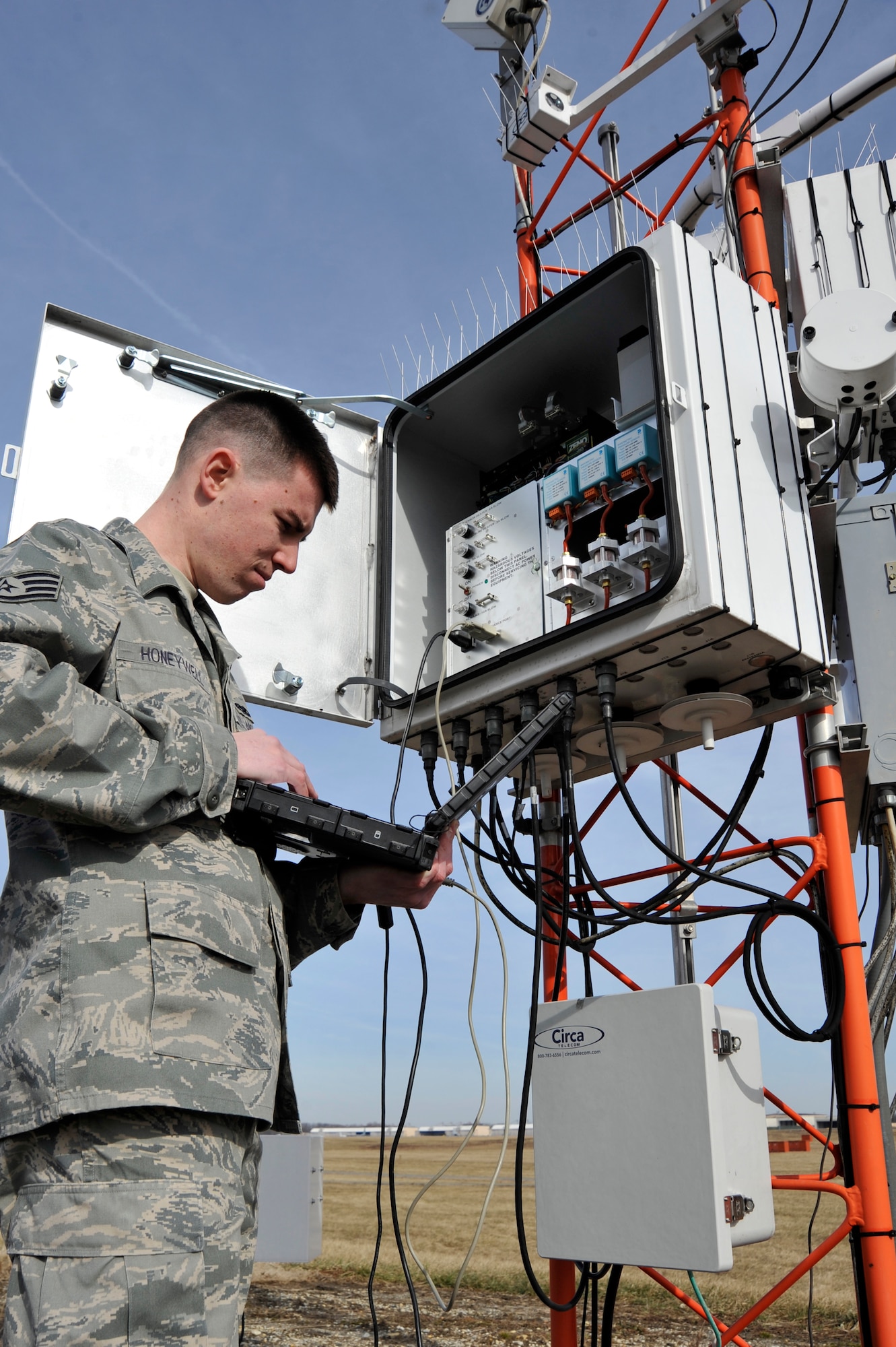 Staff Sgt. Gregory Honeywell, 744th Communication Squadron airfield systems technician, monitors system readouts from an automated weather system Jan. 21, 2010, at Joint Base Andrews. Sergeant Honeywell regularly performs preventive maintenance to ensure all equipment is running correctly. The Airmen of airfield systems maintenance perform maintenance for six bases in a 90-mile radius. (U.S. Air Force photo by Airman 1st Class Perry Aston)