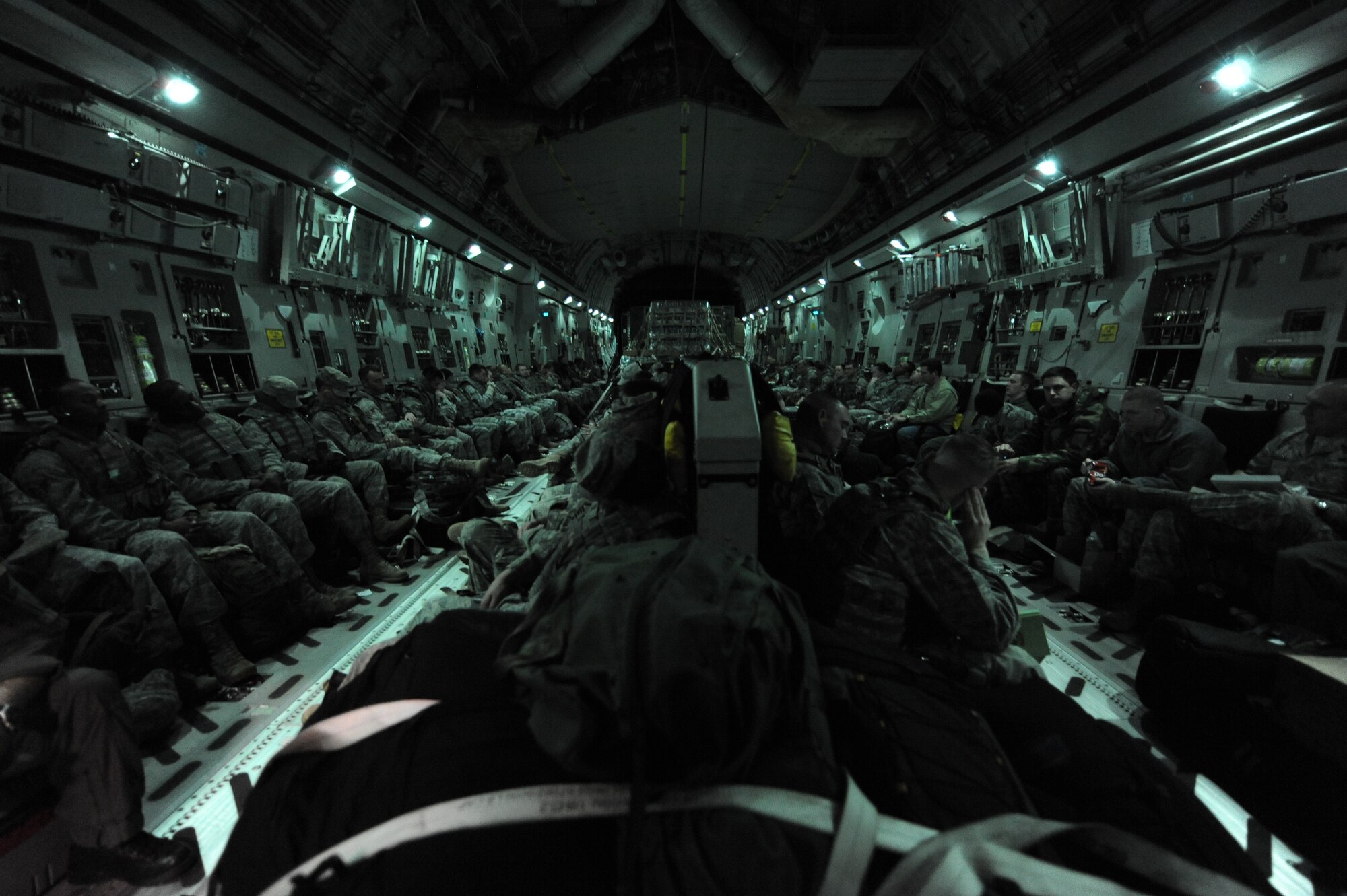 Air Force security forces  members prepare to take-off from Charleston Air Force Base on a C-17 to support relief efforts in Haiti during Operation Unified Response Jan. 22, 2010. The security forces members are from Moody AFB, Ga., and Little Rock AFB, Ark. (U.S. Air Force photo/Senior Airman Katie Gieratz)(RELEASED)