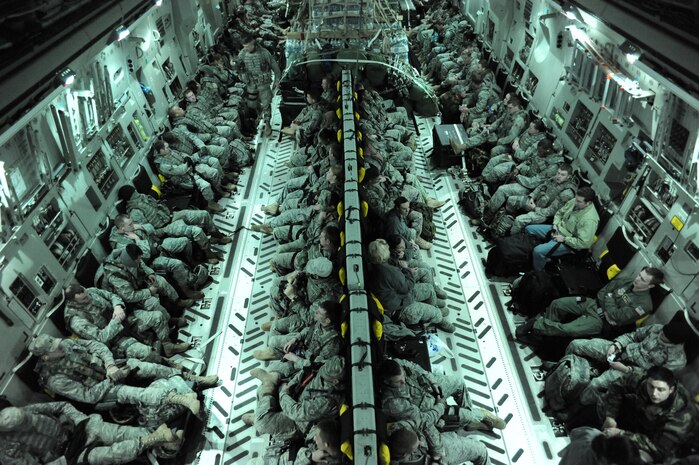 Air Force security forces members as well as intelligence members prepare to take-off from Charleston Air Force Base on a C-17 to support relief efforts in Haiti during Operation Unified Response Jan. 22, 2010. The security forces members are from Moody AFB, Ga., and the intelligence members are from Little Rock AFB, Ark. (U.S. Air Force photo/Senior Airman Katie Gieratz)(RELEASED)