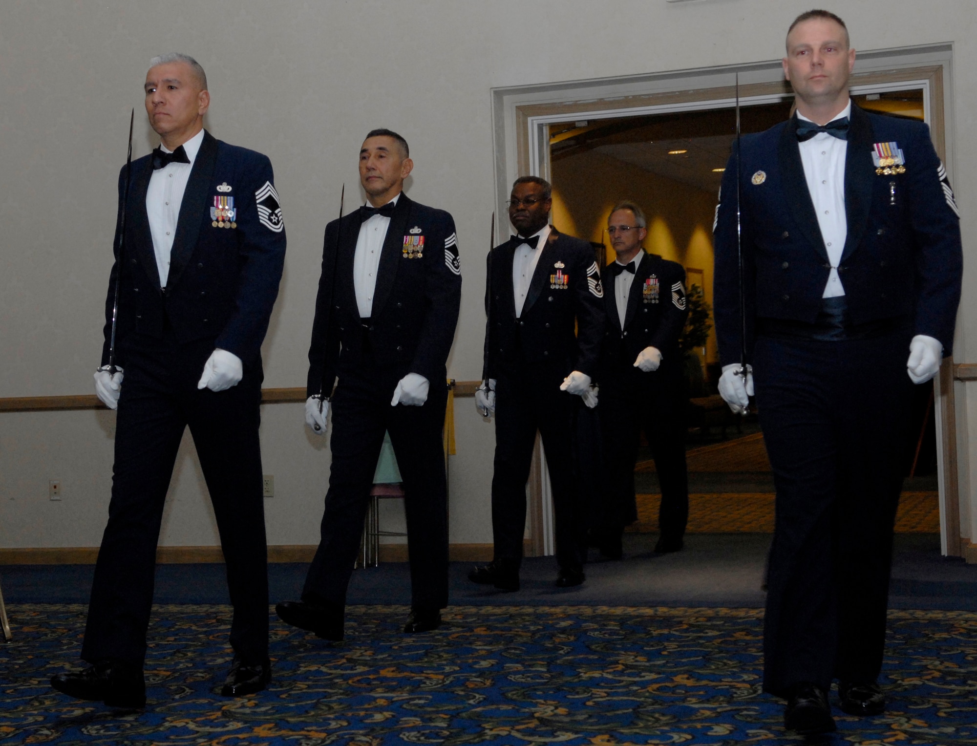 VANDENBERG AIR FORCE BASE, Calif. – Vandenberg's chief master sergeants prepare to make a sword cordon for the new CMSgt selects during the Chief Recognition Ceremony on Friday, Jan. 22, 2010, at the Pacific Coast Club here. (U.S. Air Force photo/Senior Airman Ashley Reed)