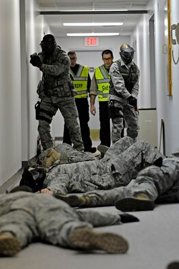 ELLSWORTH AIR FORCE BASE, S.D. – Members of the 28th Security Forces Squadron participate in an armed threat training exercise, Jan. 25. The training was designed to help Airmen understand and develop tactics against various scenarios. (U.S. Air Force photo/Airman 1st Class Matthew Flynn)
