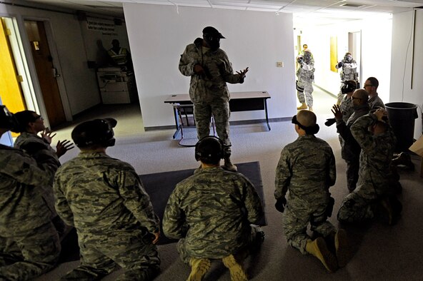 ELLSWORTH AIR FORCE BASE, S.D. – Members of the 28th Security Forces Squadron participate in an armed threat exercise, Jan. 25. The 28 SFS personnel received specific training from the Pennington County Sheriff’s Department special response team to help Airmen understand and develop tactics against various scenarios. (U.S. Air Force photo/Airman 1st Class Matthew Flynn)