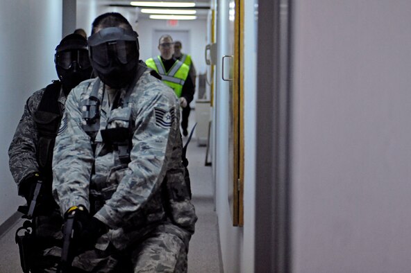 ELLSWORTH AIR FORCE BASE, S.D. – Members of the 28th Security Forces Squadron participate in a tactical training scenario, Jan. 25. The 28 SFS personnel received specialized training from the Pennington County Sheriff’s Department special response team to help Airmen understand and develop tactics against armed threat scenarios. (U.S. Air Force photo/Airman 1st Class Matthew Flynn)