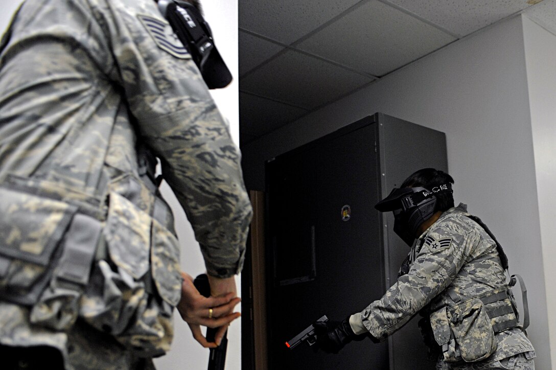 ELLSWORTH AIR FORCE BASE, S.D. – Members of the 28th Security Forces Squadron clear a room during tactical training, Jan. 25. The 28 SFS personnel received training from the Pennington County Sheriff’s Department to help Airmen understand and develop tactics against armed threat scenarios. (U.S. Air Force photo/Airman 1st Class Matthew Flynn)