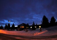 MINOT AIR FORCE BASE, N.D. -- The sun rises behind the 91st Missile Wing headquarters signaling the beginning of a new day here Jan. 26. The blue sky gives Minot AFB a feeling of a fresh start so Minot Airmen may continue providing for safe, secure and reliable bomber and missile missions. (U.S. Air Force photo by Airman 1st Class Ashley N. Avecilla)