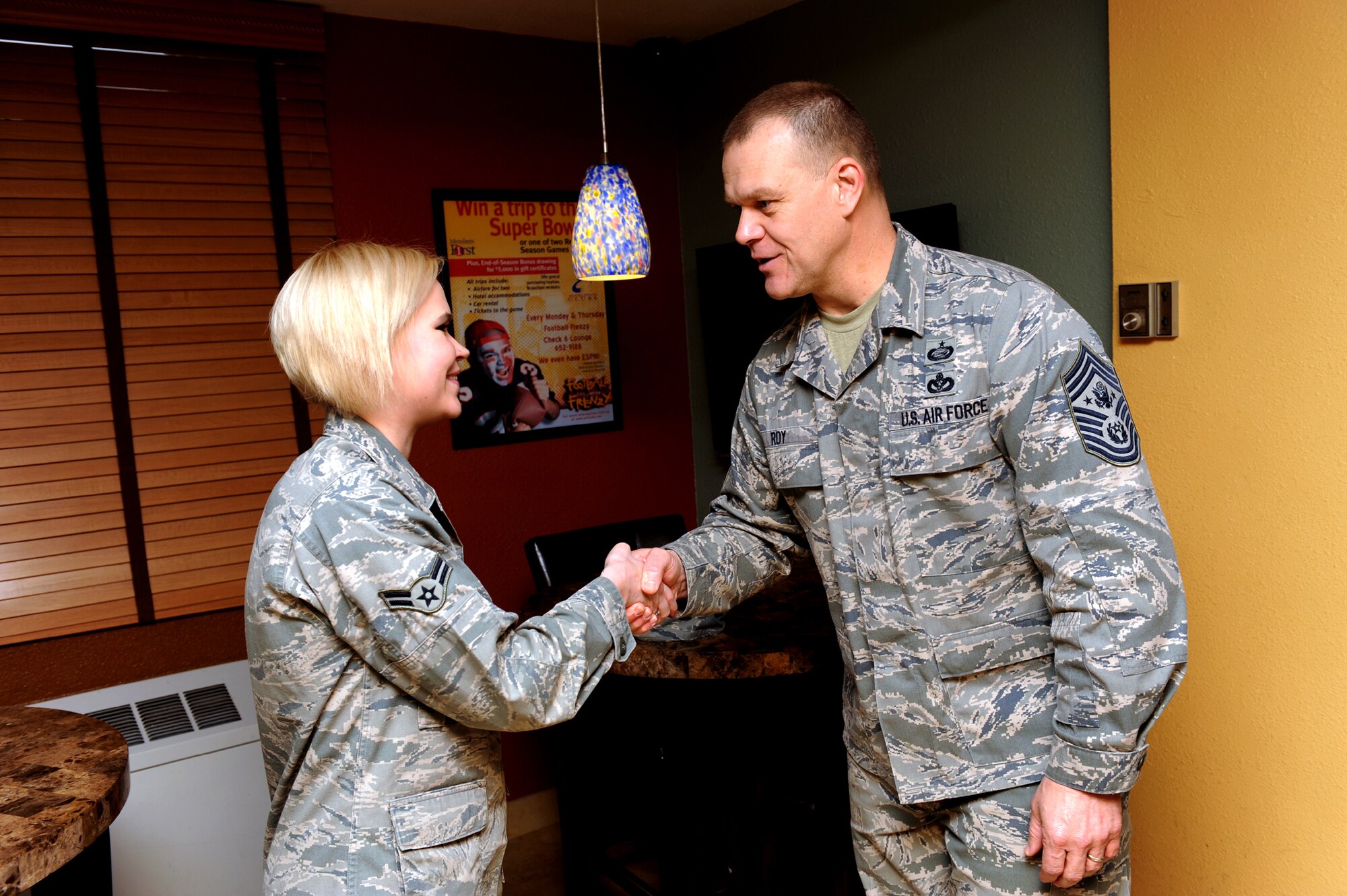 NELLIS AIR FORCE BASE, Nev. -- Chief Master Sgt. of the Air Force James Roy presents Airman 1st Class Rachel Crepeau with a coin, Jan. 22. Airman Crepeau dedicated several hours toward the Airman Against Drunk Driving program, a program that prevents Airmen from driving under the influence. Chief Roy visited the enlisted Airmen assigned to Nellis AFB, Creech AFB, and Fort Irwin. (U.S. Air Force photo by Airman 1st Class Brett Clashman/RELEASED)






















  












 











































  












 
























