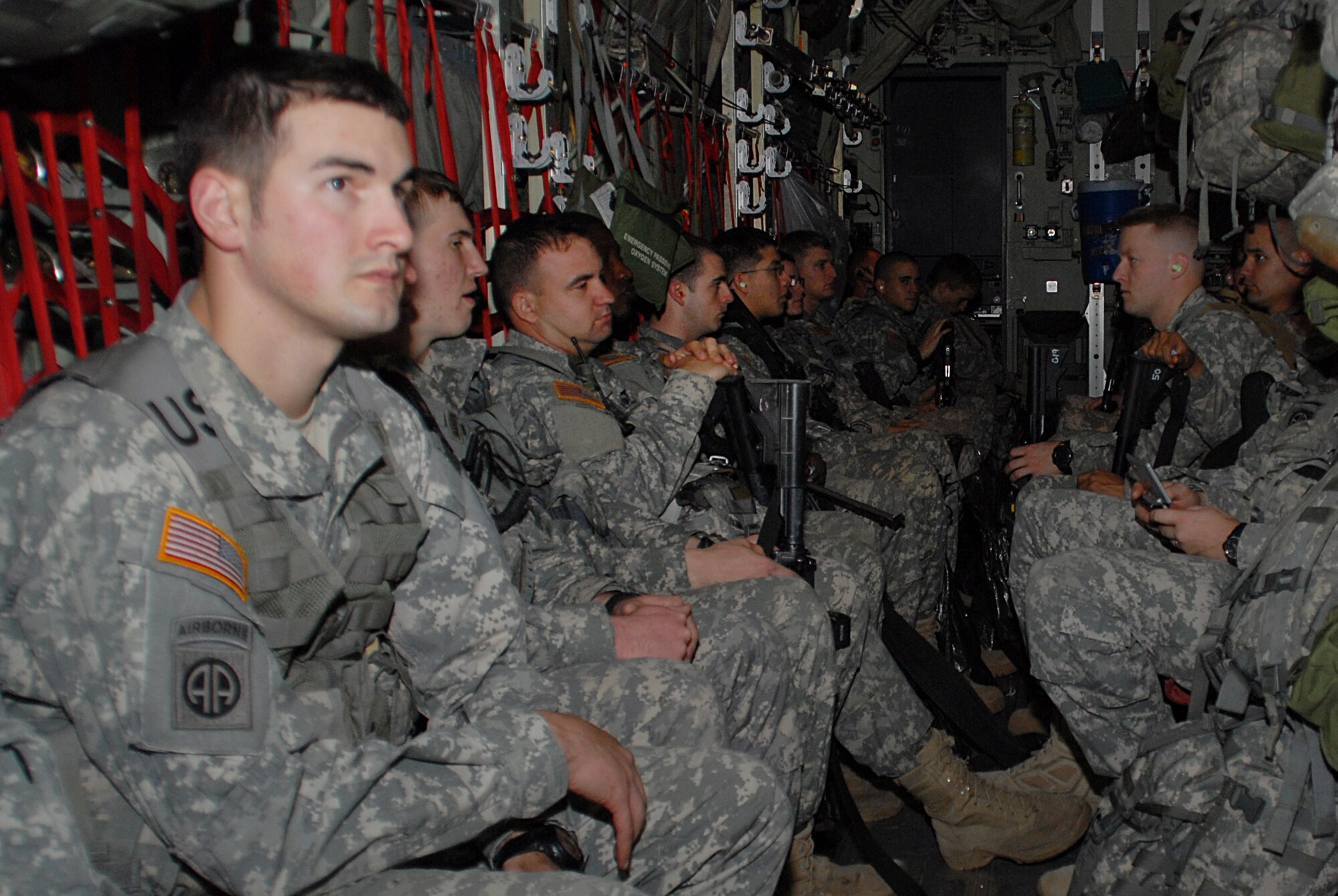 Army Rangers from the 2nd Battalion, 325th Airborne Infantry Regiment from Fort Bragg, N.C., ride aboard a 41st Airlift Squadron C-130J bound for Haiti Jan. 19 in support of Operation Unified Response. The Rangers deployed to Haiti to deliver security and resupply the Haitians, said 1st Lt. Fredrick Lough, the platoon's commander. (U.S. Air Force photo by Capt. Joe Knable)