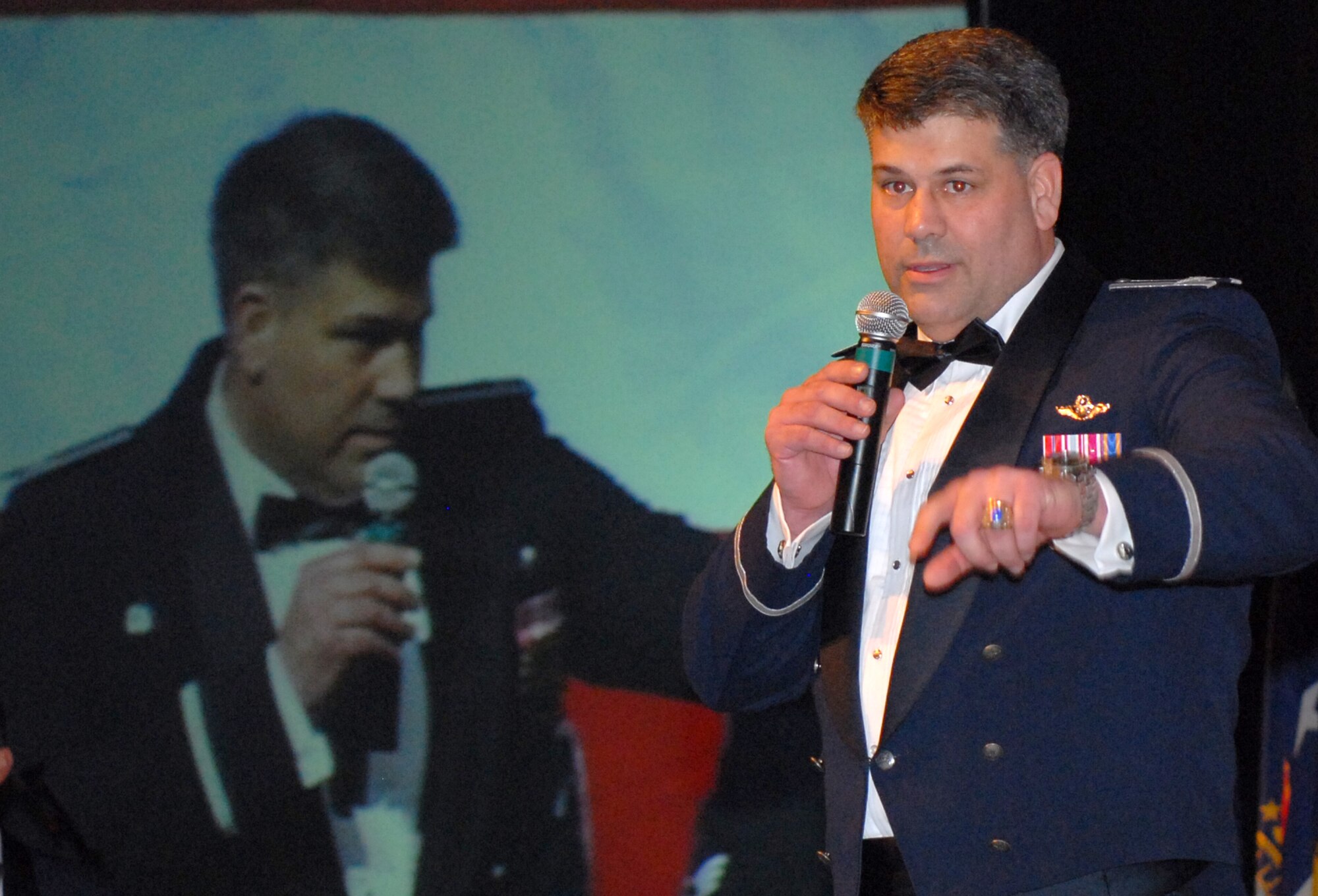 Colonel Greg Otey, 19th Airlift Wing commander, addressed the audience Jan. 22 at the annual awards banquet, encouraging base personnel to keep up the good work and thanking them for their hard work and dedication. The annual awards banquet acknowledged and awarded hard working Airmen and civilian employees around the base for their hard work and dedication. (U. S. Air Force photo by Senior Airman Christine Clark)