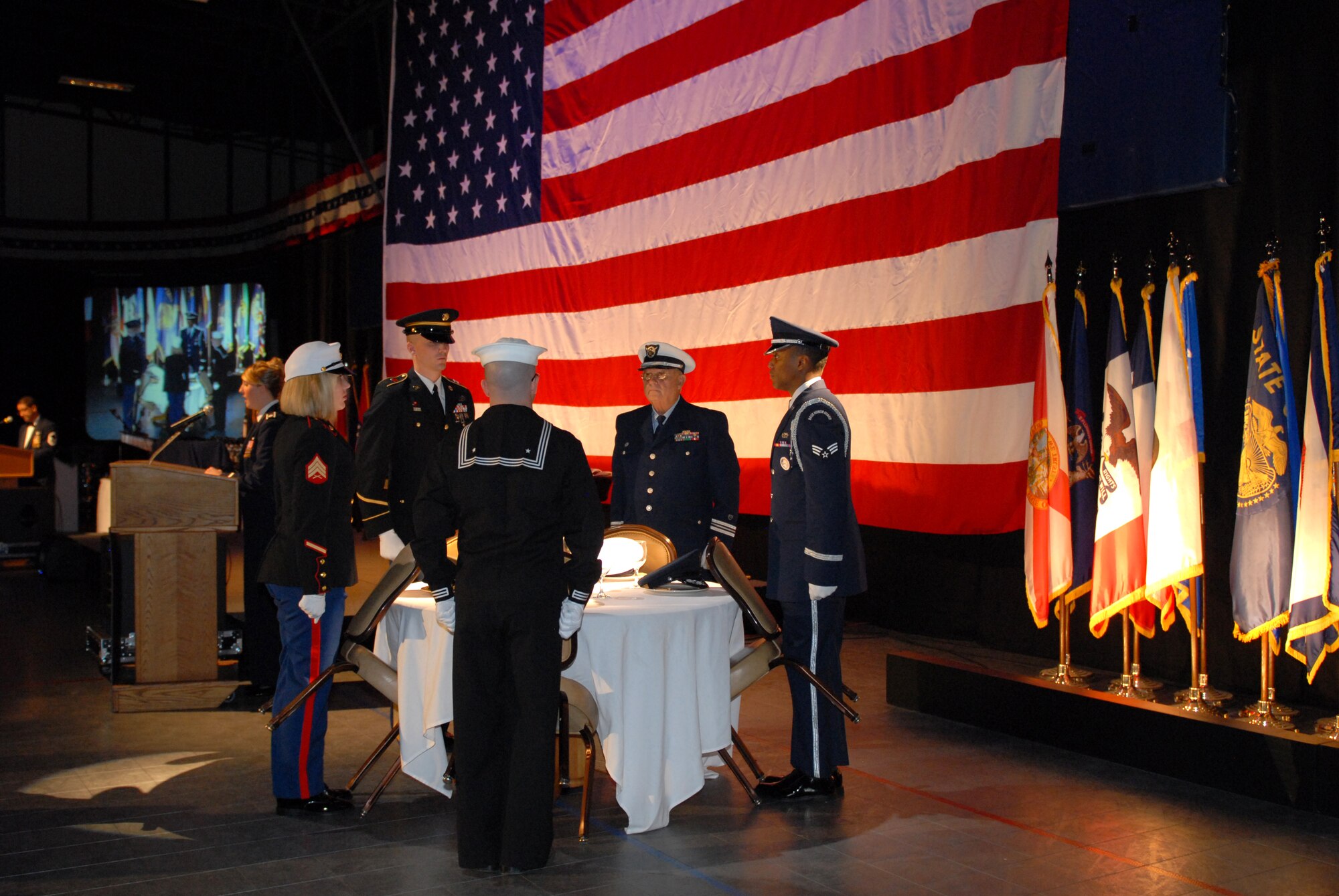 A member from each branch of service performed a POW/MIA ceremony Jan. 22 at the annual awards banquet. The annual awards banquet acknowledged and awarded hard working Airmen and civilian employees around the base for their hard work and dedication. (U. S. Air Force photo by Senior Airman Christine Clark)