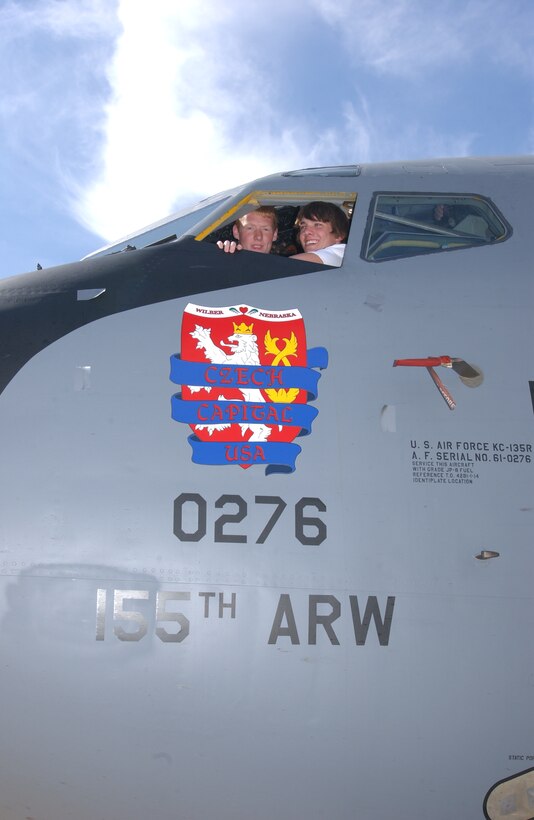 Brandon Scusa (left) and Nick Hartwig, of Wilber/Claytonia highschool, Wilber, Neb. look out from the cockpit window of the Nebraska Air National Guard KC-135R Stratotanker that will carry their winning noseart design for the next year. The 155th Air Refueling Wing runs a contest for its members to nominate their hometown for aircraft nose art. This program is designed to help educate the people of Nebraska about the Air National Guard and to promote recruiting opportunities. (Nebraska Air Natinal Guard photo by Master Sgt. Alan Brown)