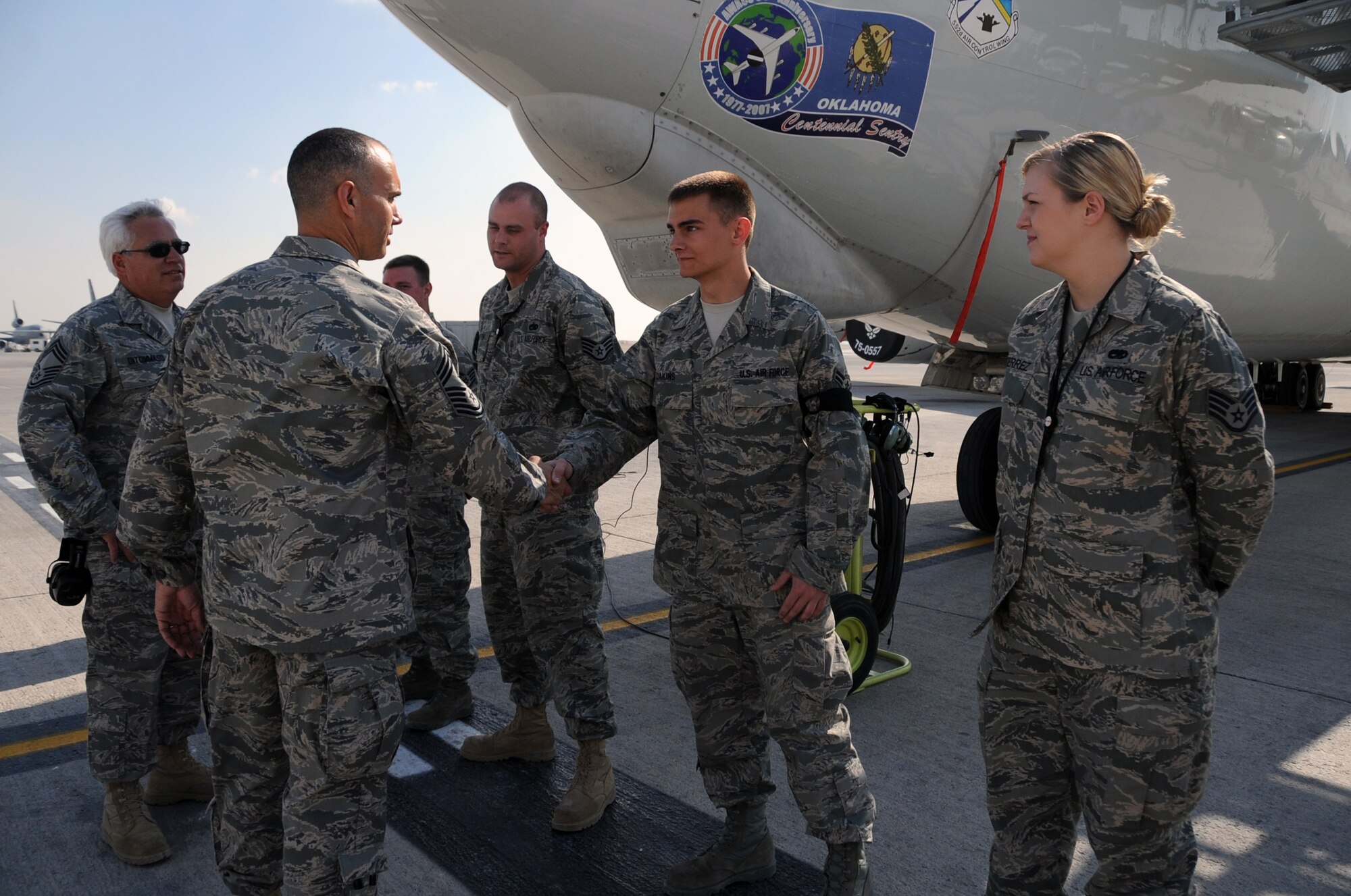 Chief Master Sgt. Mark Villella, command chief master sergeant for Air Forces Central Command, meets with E-3 Sentry maintenance Airmen during his visit to the 380th Air Expeditionary Wing at a non-disclosed base in Southwest Asia on Jan. 6, 2010.  During his visit, Chief Villella learned about the diverse mission of the 380th AEW that includes air refueling, surveillance, and reconnaissance in support of overseas contingency operations in Southwest Asia. The wing supports Operations Iraqi Freedom and Enduring Freedom and the Combined Joint Task Force-Horn of Africa. (U.S. Air Force Photo/Senior Airman Jenifer Calhoun/Released)