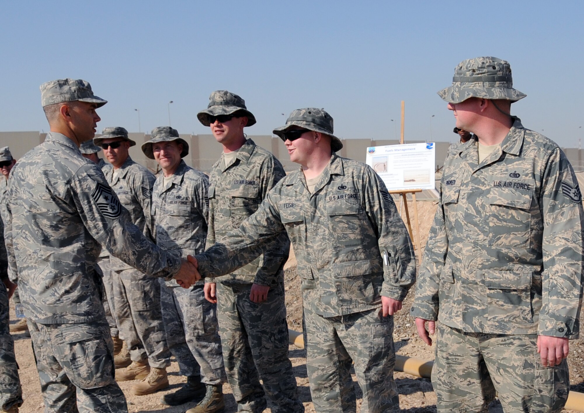 Chief Master Sgt. Mark Villella, command chief master sergeant for Air Forces Central Command, meets with fuels Airmen of the 380th Expeditionary Logistics Readines Squadron during his visit to the 380th Air Expeditionary Wing at a non-disclosed base in Southwest Asia on Jan. 6, 2010.  During his visit, Chief Villella learned about the diverse mission of the 380th AEW that includes air refueling, surveillance, and reconnaissance in support of overseas contingency operations in Southwest Asia. The wing supports Operations Iraqi Freedom and Enduring Freedom and the Combined Joint Task Force-Horn of Africa. (U.S. Air Force Photo/Senior Airman Jenifer Calhoun/Released)