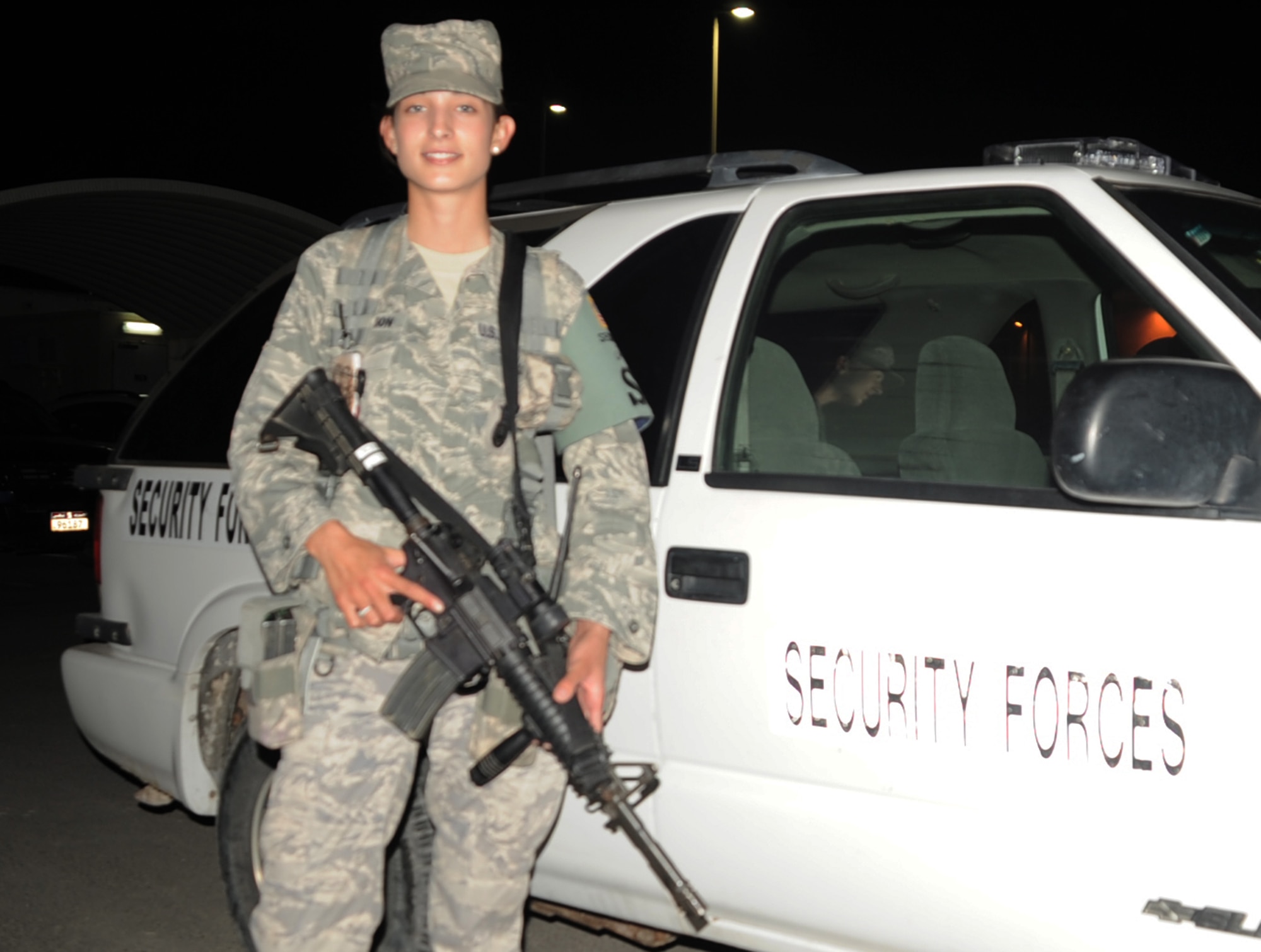 Senior Airman Jaqueline Lawson, security forces journeyman with the 380th Expeditionary Security Forces Squadron, works during night shift operations at a non-disclosed base in Southwest Asia on Jan 24, 2010. Airman Lawson is a security forces journeyman charged, along with fellow security forces, with providing security and force protection for the 380th Air Expeditionary Wing, its people and millions of dollars in deployed equipment and assets. Airman Lawson is deployed from the 96th Security Forces Squadron at Eglin Air Force Base, Fla., and her hometown is Middleburg, Fla. (U.S. Air Force Photo/Tech. Sgt. Scott T. Sturkol/Released)