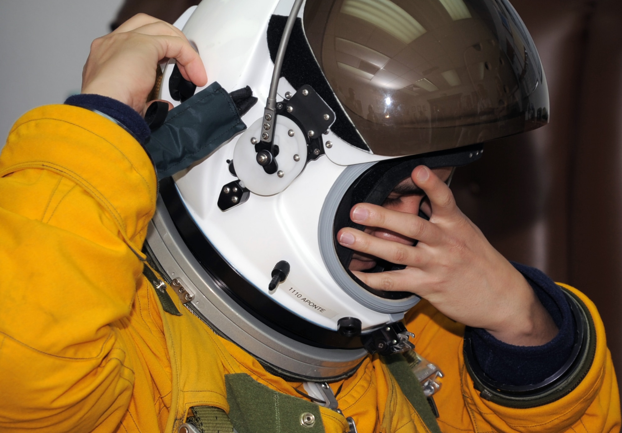 Capt. Tony Aponte, U-2 Dragon Lady pilot with the 99th Expeditionary Reconnaissance Squadron at a non-disclosed location in Southwest Asia, suits up prior to a mission on Jan. 23, 2010.  Because the U-2 flies as high an altitude as 70,000 feet, pilots are required to wear a special suit to complete their mission.  The 99th ERS, part of the 380th Air Expeditionary Wing, supports Operations Iraqi Freedom and Enduring Freedom and the Combined Joint Task Force-Horn of Africa. (U.S. Air Force Photo/Tech. Sgt. Scott T. Sturkol/Released)