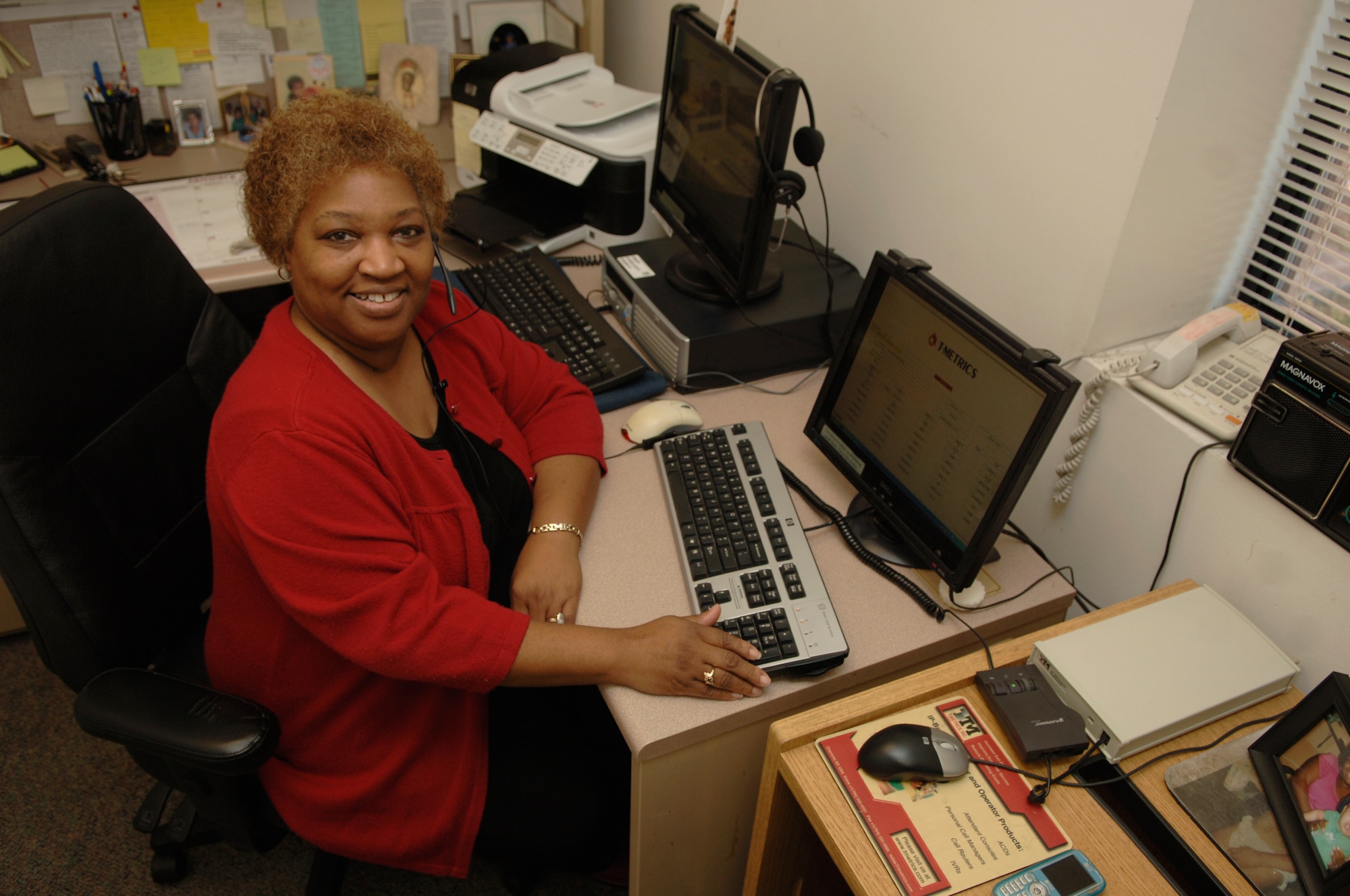 Shirley Poue works a busy schedule as a supervisor and telephone operator with the 628th Communications Squadron at Charleston AFB. As a base operator, her foremost duties are to guide and direct outside callers as well as those from within Charleston AFB. She also supervises six others. Since the disaster in Haiti, Mrs. Poue has been taking an dramatic increase in phone calls from the public, the media and other bases inquiring on what they can do to help with the crisis. The New York City native supports Charleston's mission every day and said it feels great to be a part of it "because we connect loved ones with military personnel all over the world."
(U.S. Air Force photo/Airman 1st Class Lauren Main)